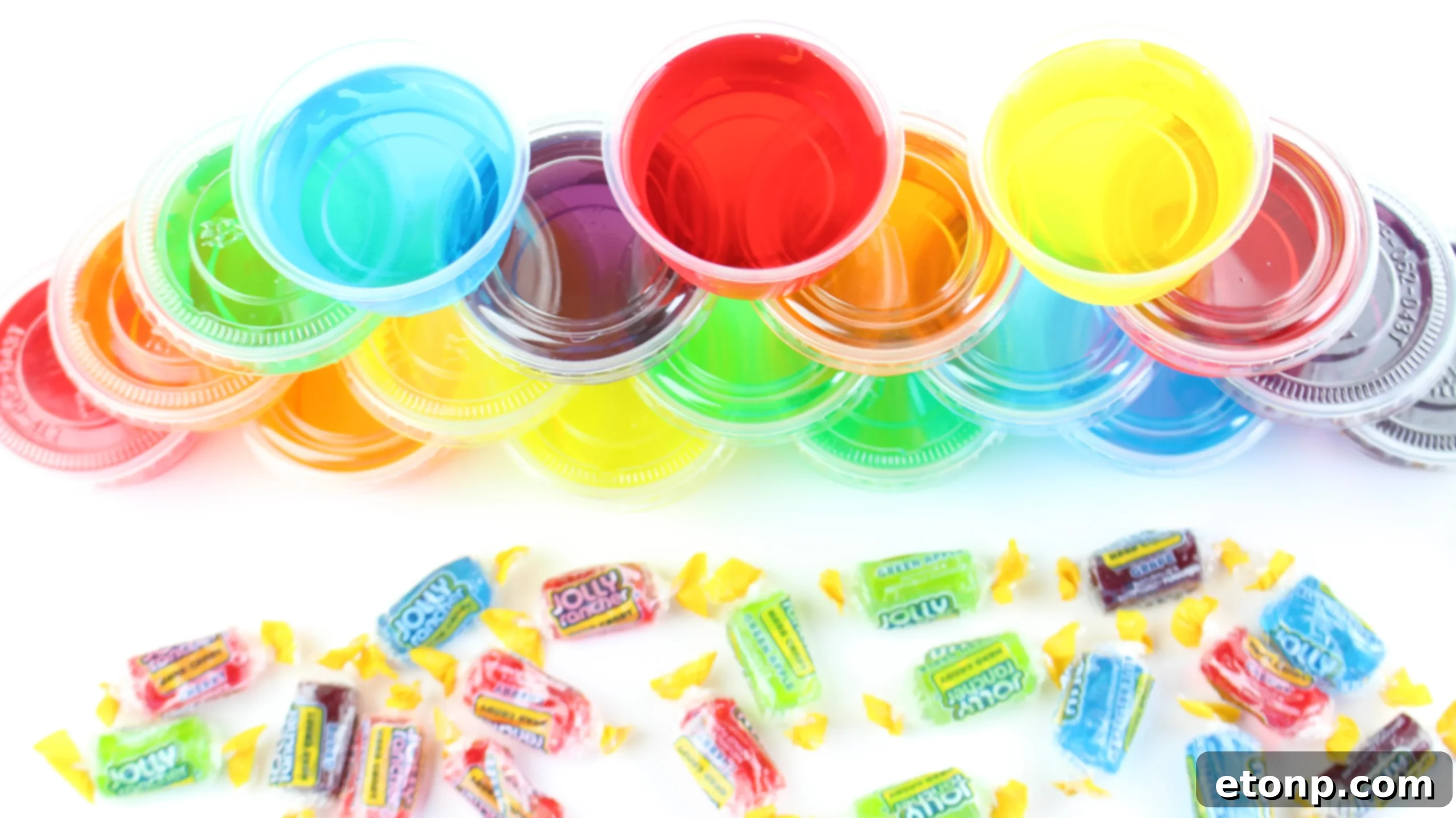 A close-up of several colorful Jello Shots glistening, ready to be picked up