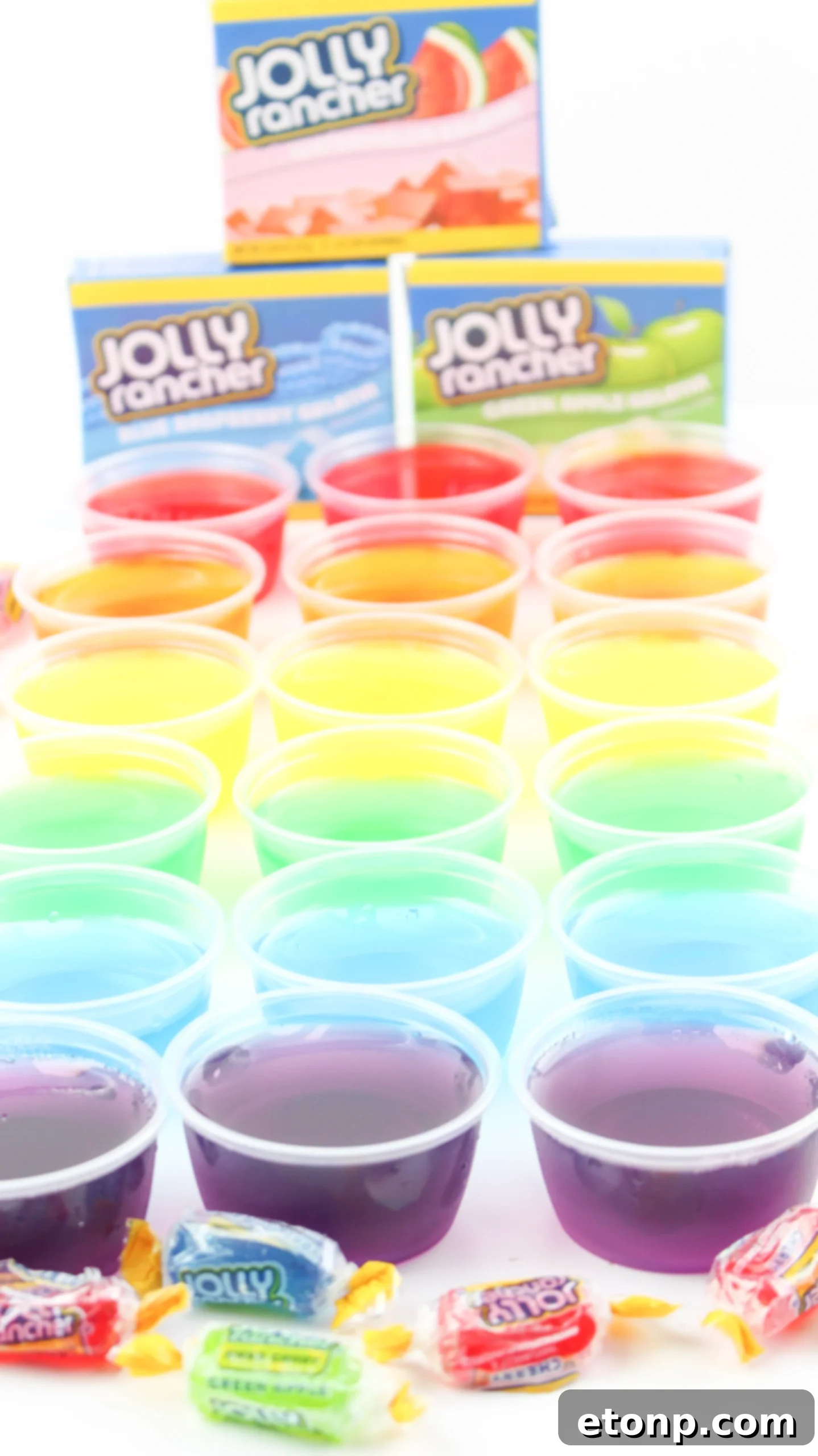 A selection of diverse jello shots, including creamy and fruit-flavored options