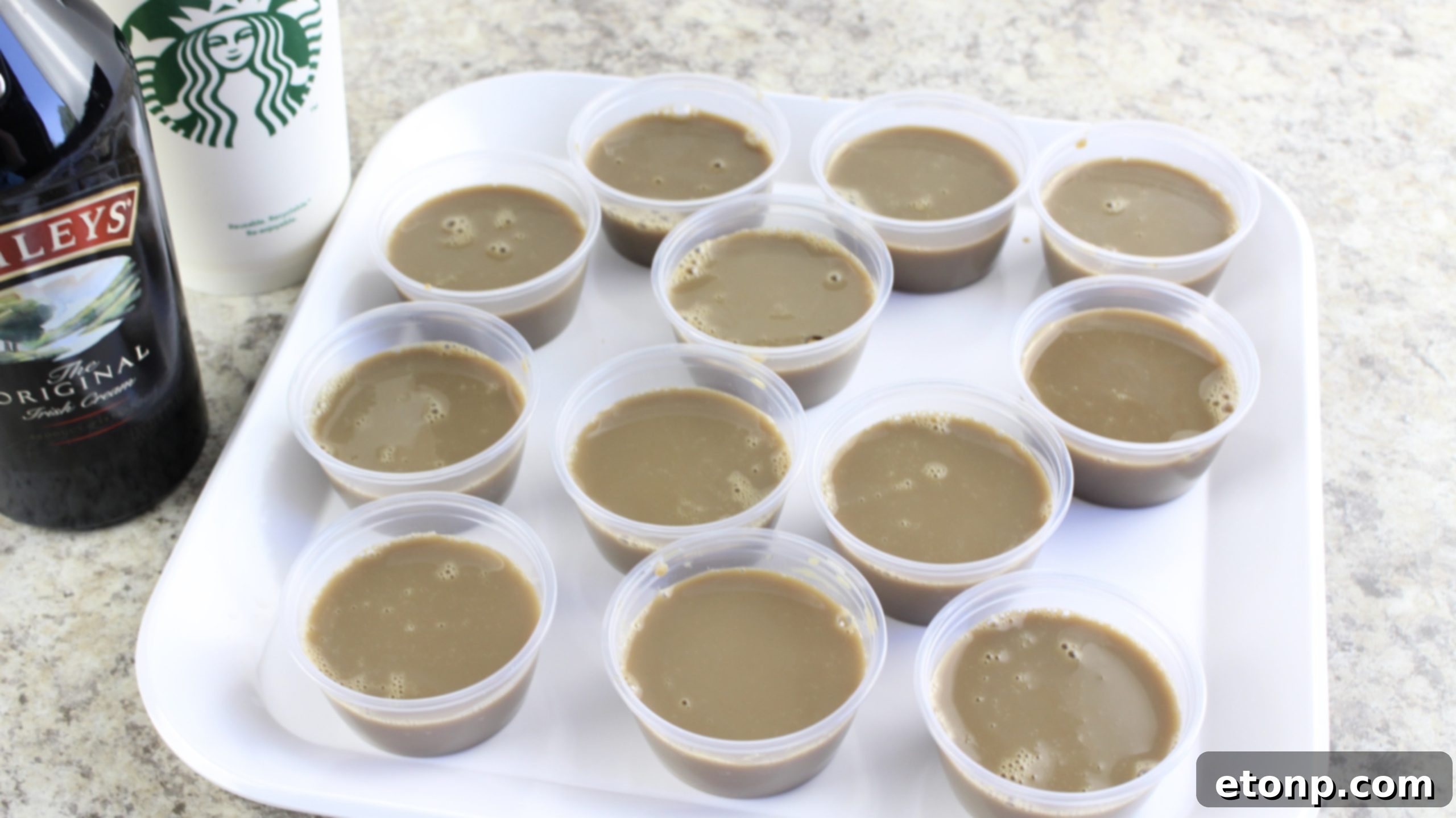 Close-up of a Baileys Irish Cream Jello Shot with a hint of coffee, showcasing its creamy texture.