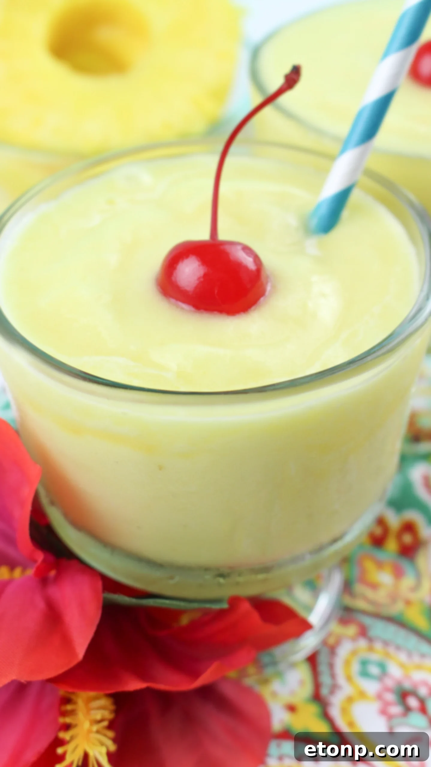 Close-up of the smooth, swirled texture of a homemade Dole Pineapple Whip