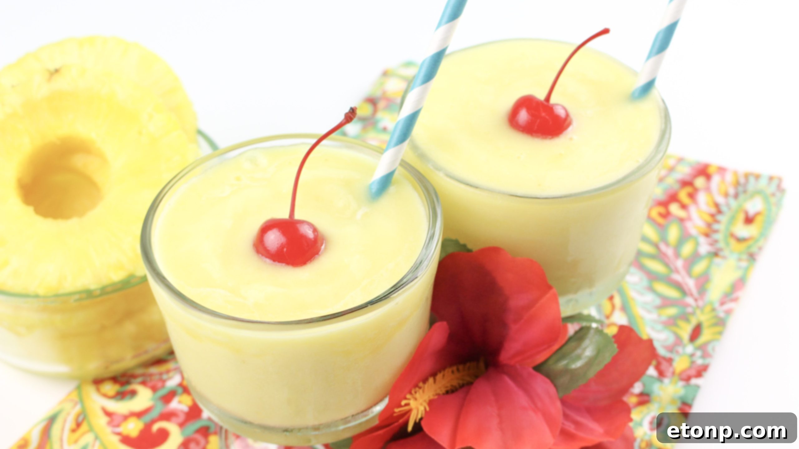 Two servings of Dole Pineapple Whip on a table, ready to be enjoyed