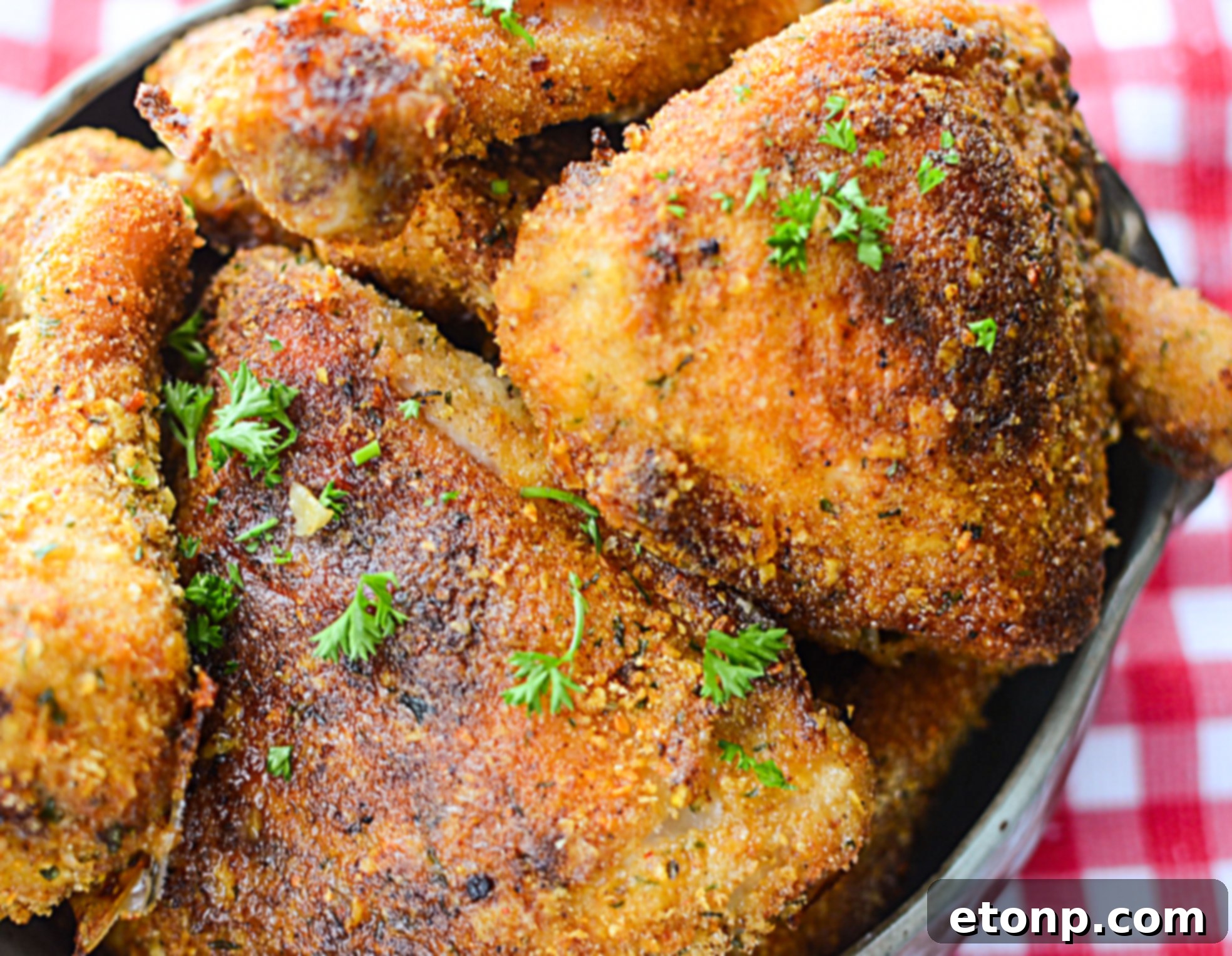 Close-up of a perfectly cooked piece of Taco Fried Chicken, emphasizing its texture and appeal