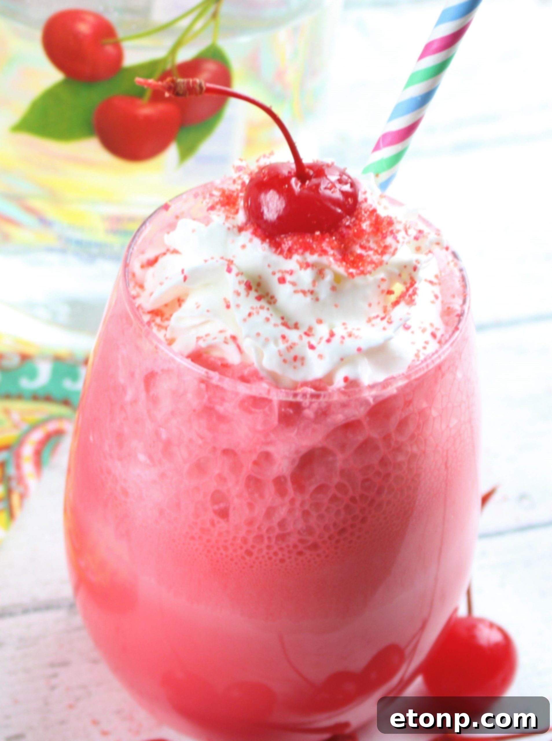 Finished Boozy Italian Cherry Ice Cream Soda with whipped cream and cherry