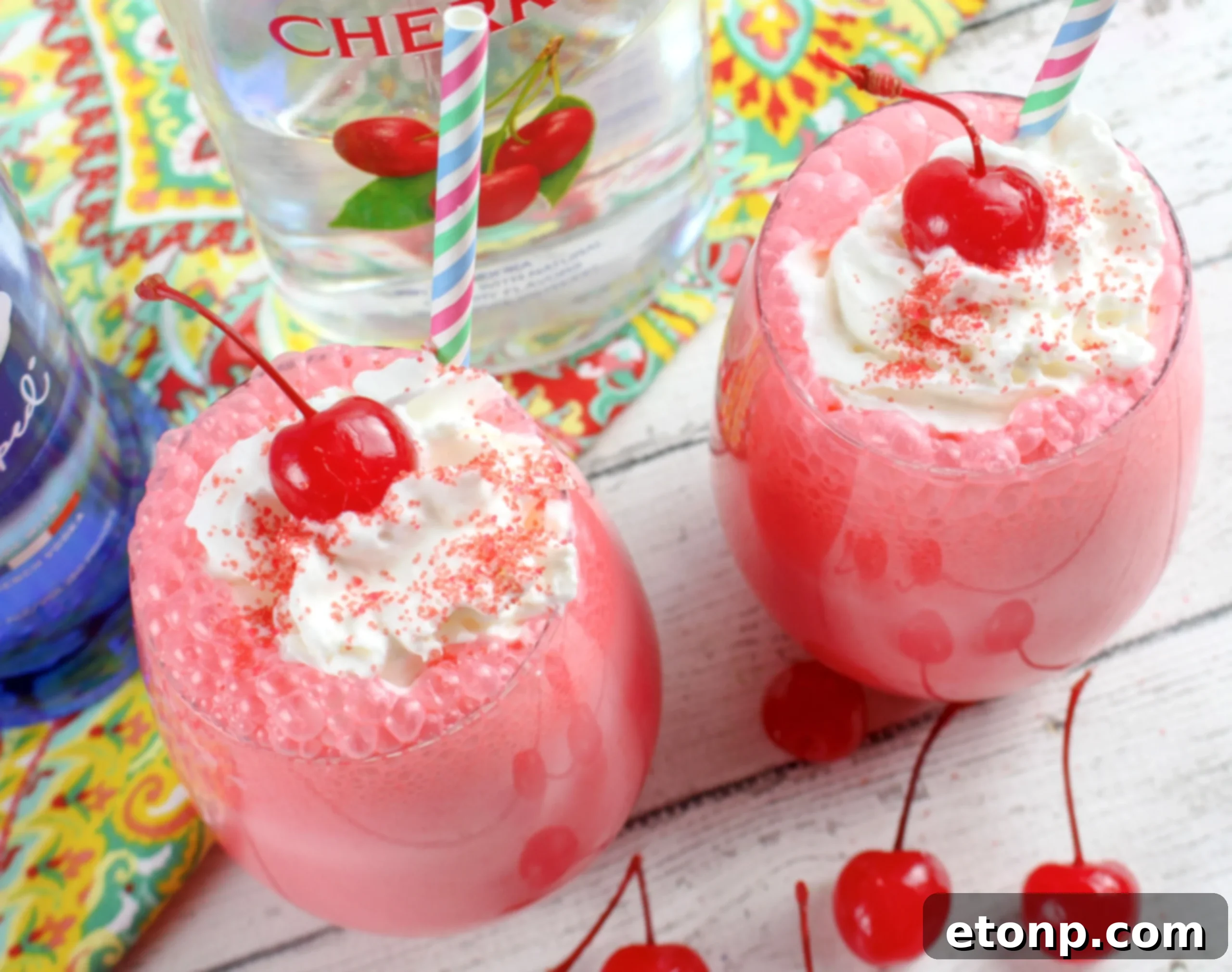 Close-up of a Boozy Italian Cherry Ice Cream Soda with a straw