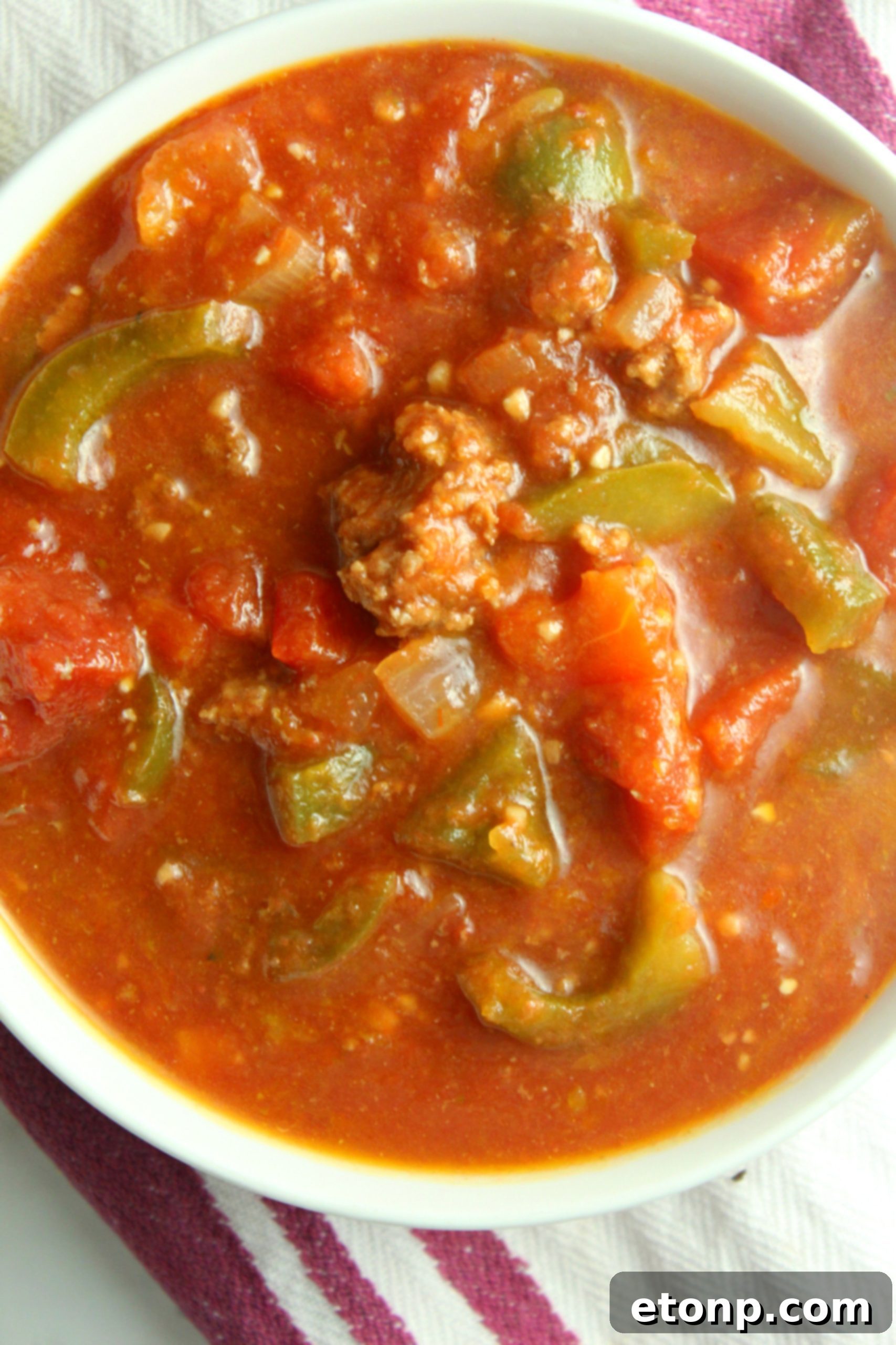 Homestyle Stuffed Pepper Stew 7 Another view of the hearty stuffed pepper soup simmering in a pot, showcasing its rich texture.