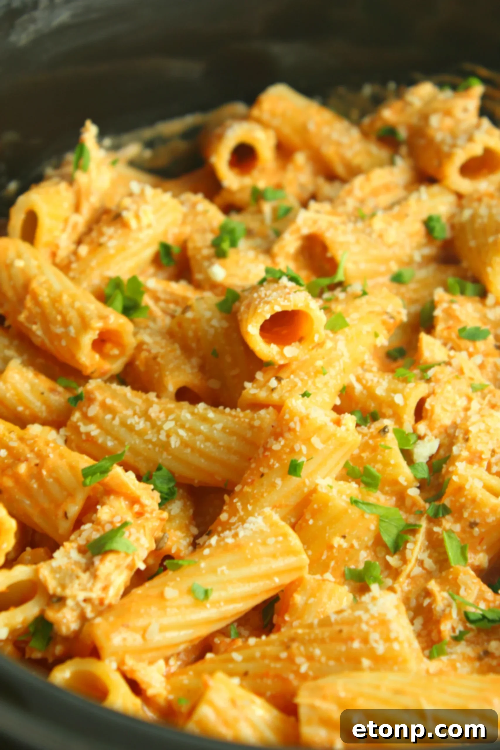 Another angle of creamy chicken rigatoni, showcasing its rich texture