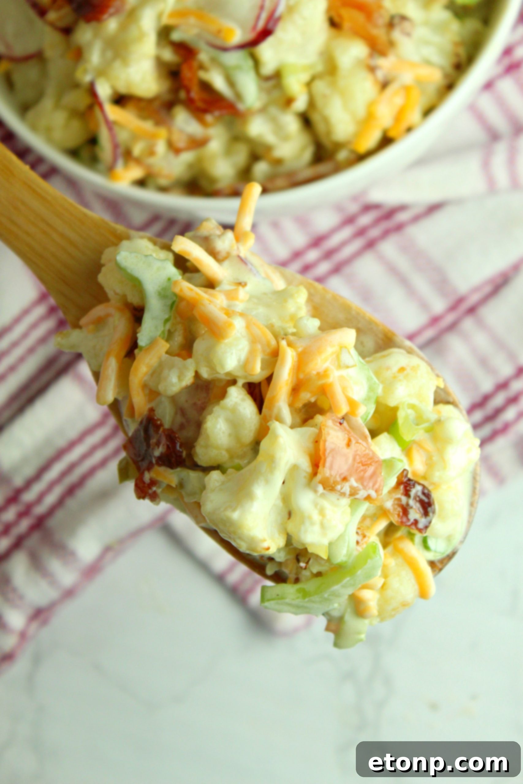 Close-up of freshly prepared loaded cauliflower salad