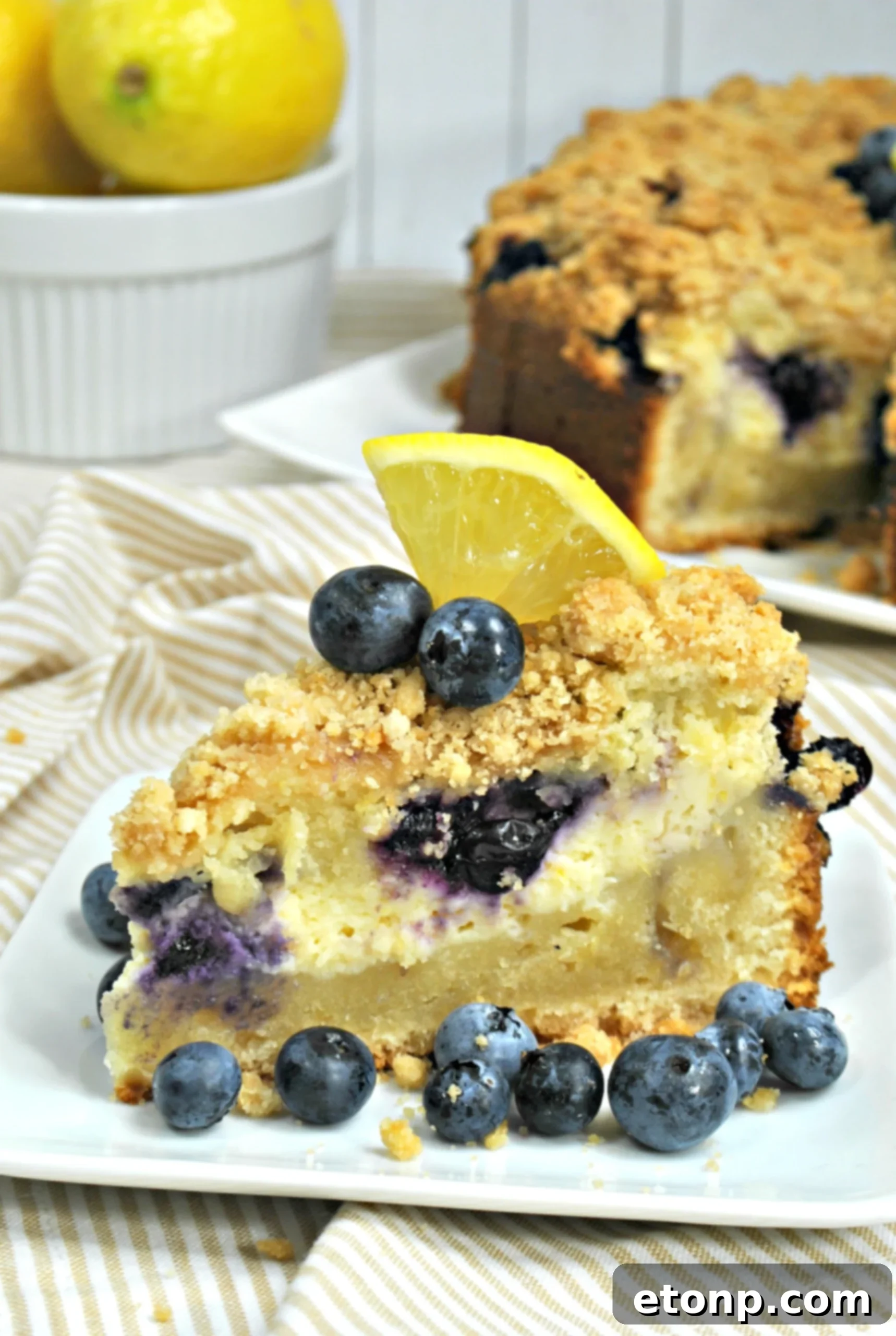 An appetizing overhead shot of a slice of coffee cake with coffee, emphasizing a cozy breakfast scene.