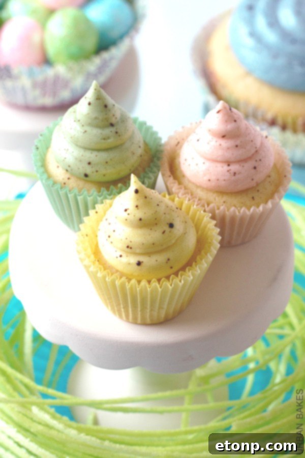 Delicious Cadbury Creme Egg Cupcakes topped with chocolate eggs