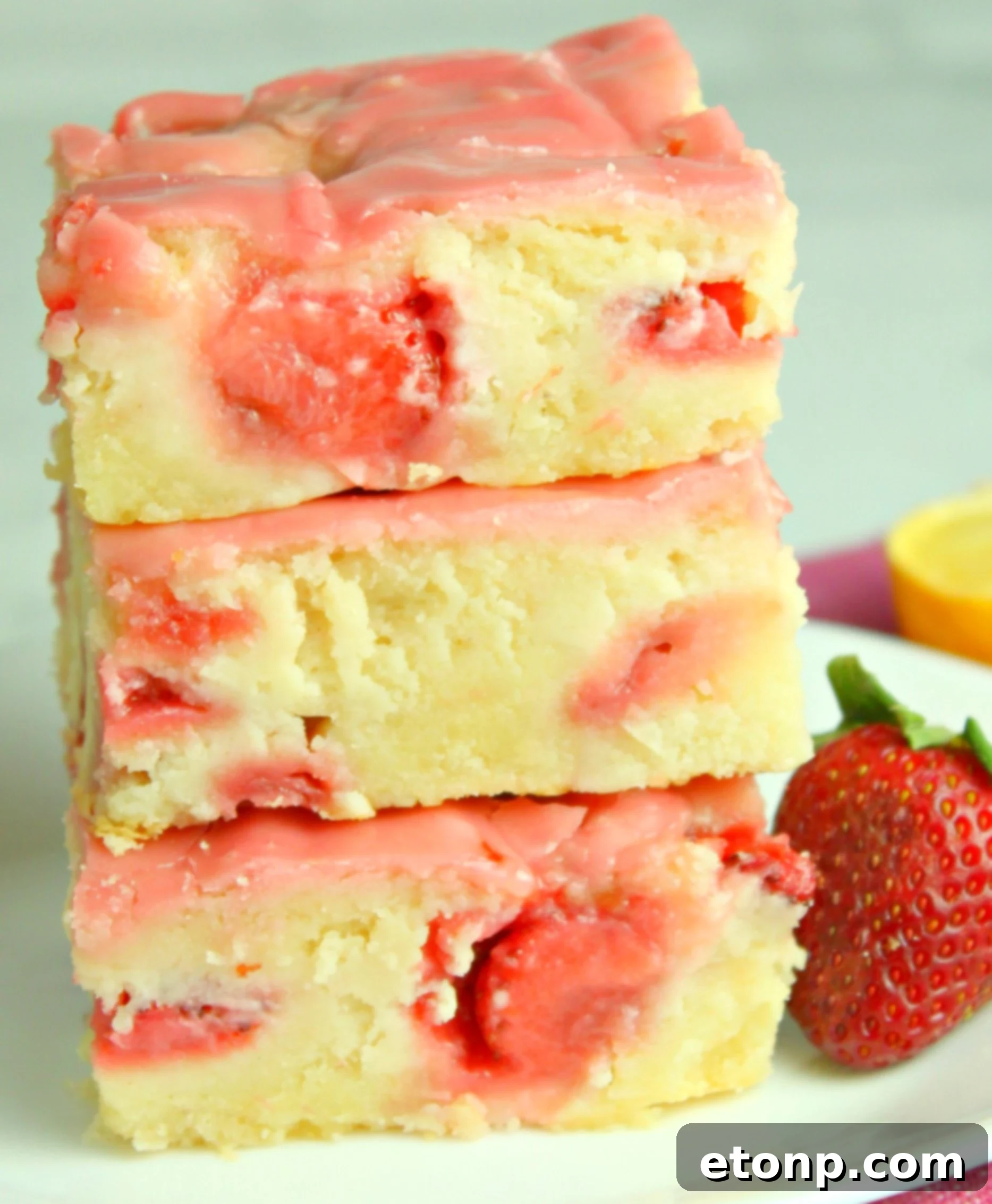 Homemade Strawberry Lemon Blondies 2 Delicious strawberry lemon blondies with a vibrant pink icing