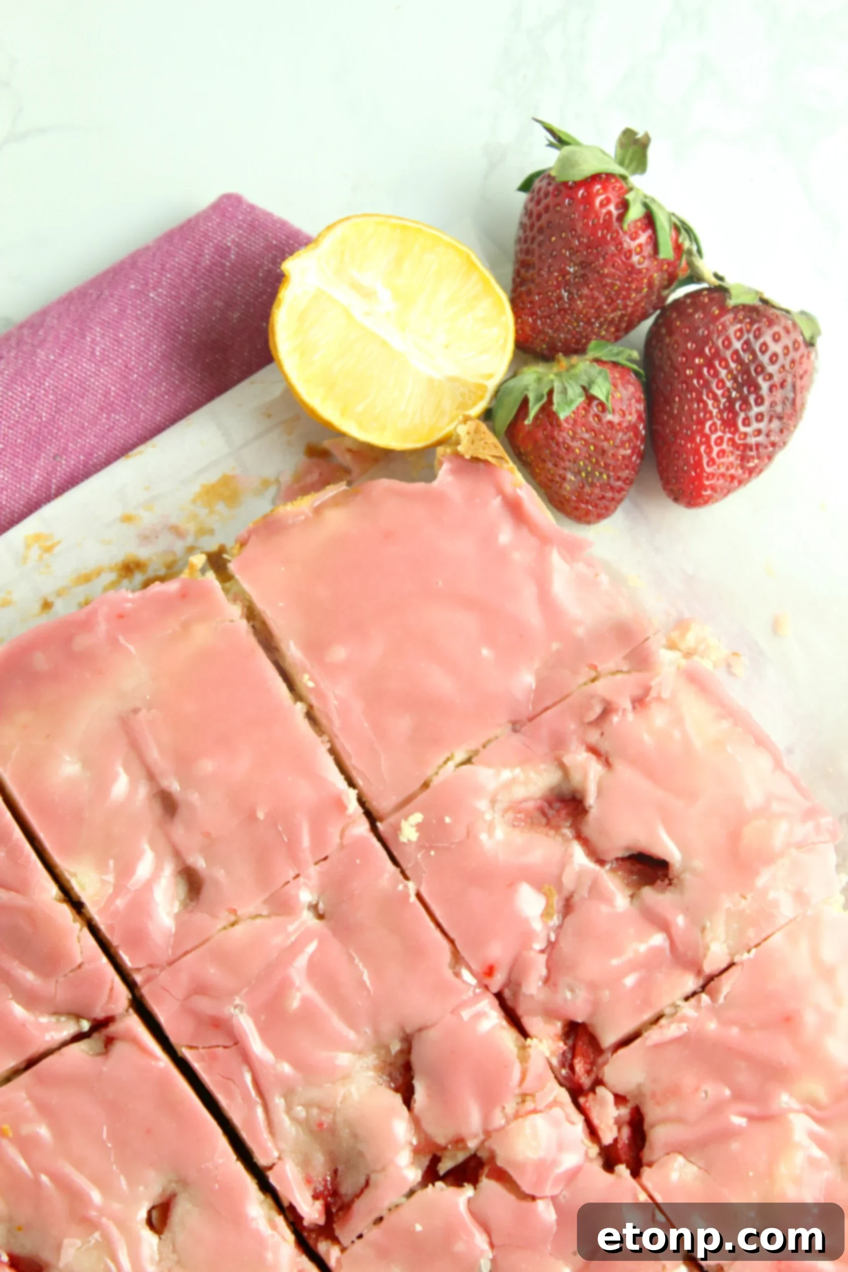 Homemade Strawberry Lemon Blondies 3 Close-up of a single strawberry lemon blondie slice on a white plate
