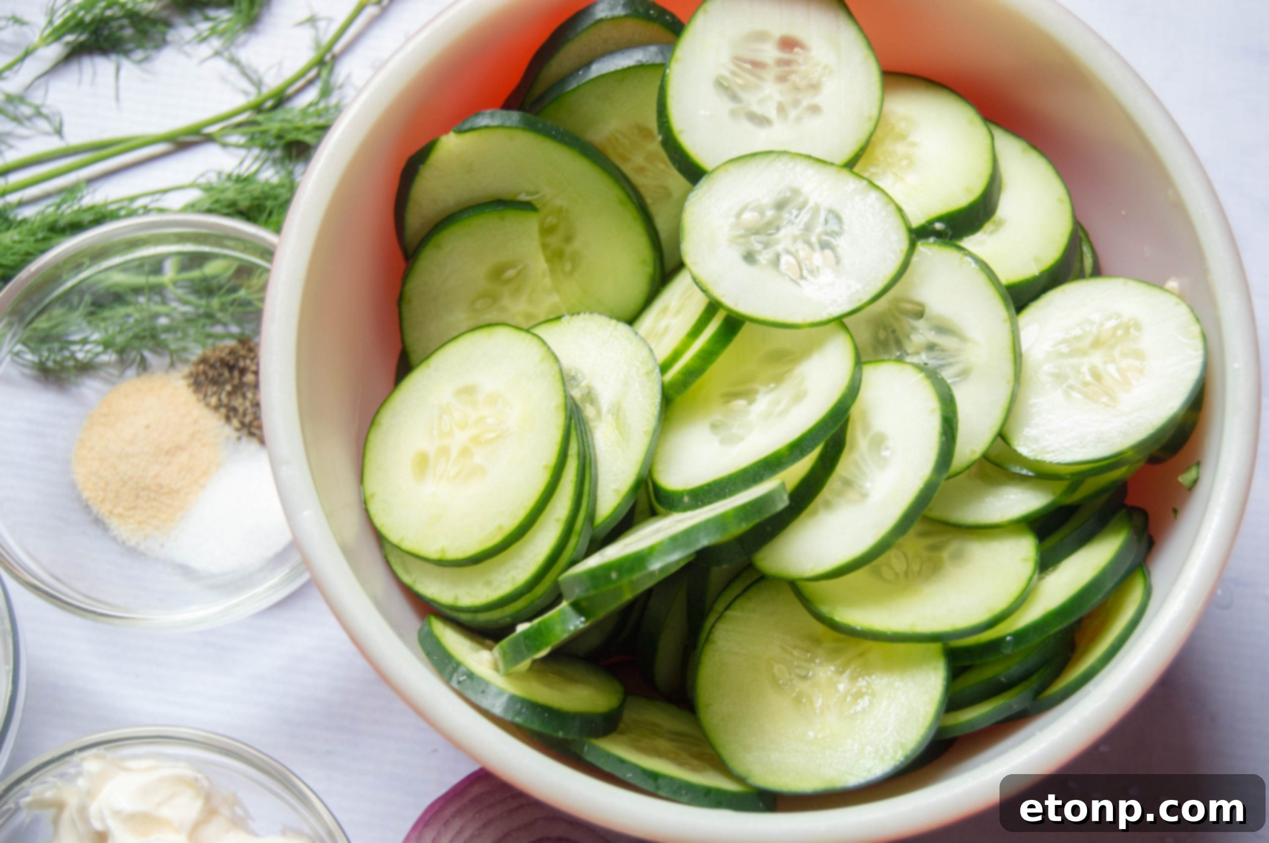 Close-up of creamy cucumber salad in a serving bowl