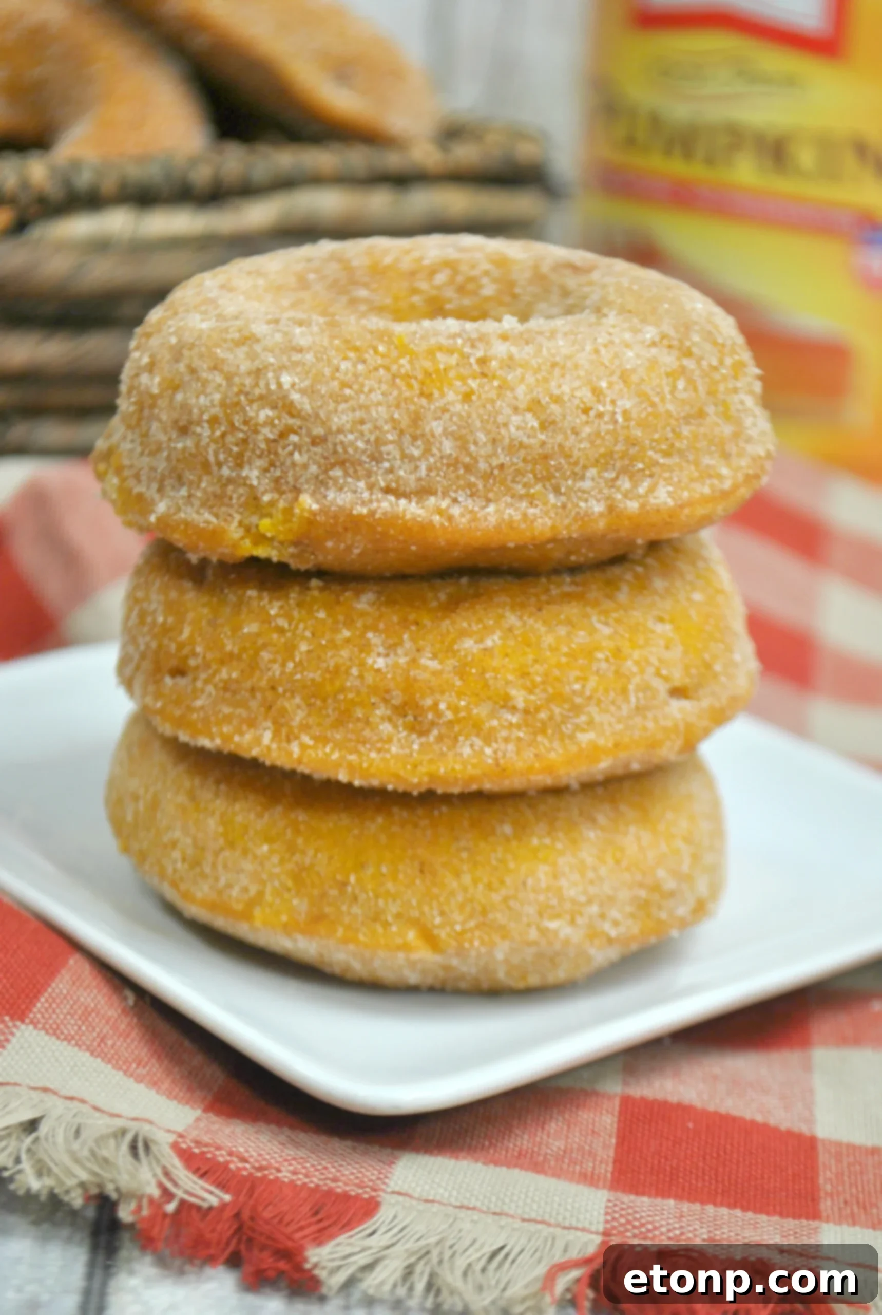 Delicious baked pumpkin spice donuts ready to be glazed