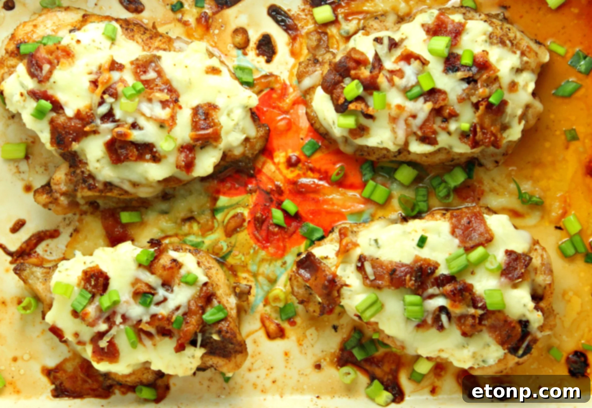 Delicious Smothered Crack Chicken baked to golden perfection, served as a mouth-watering low carb meal option