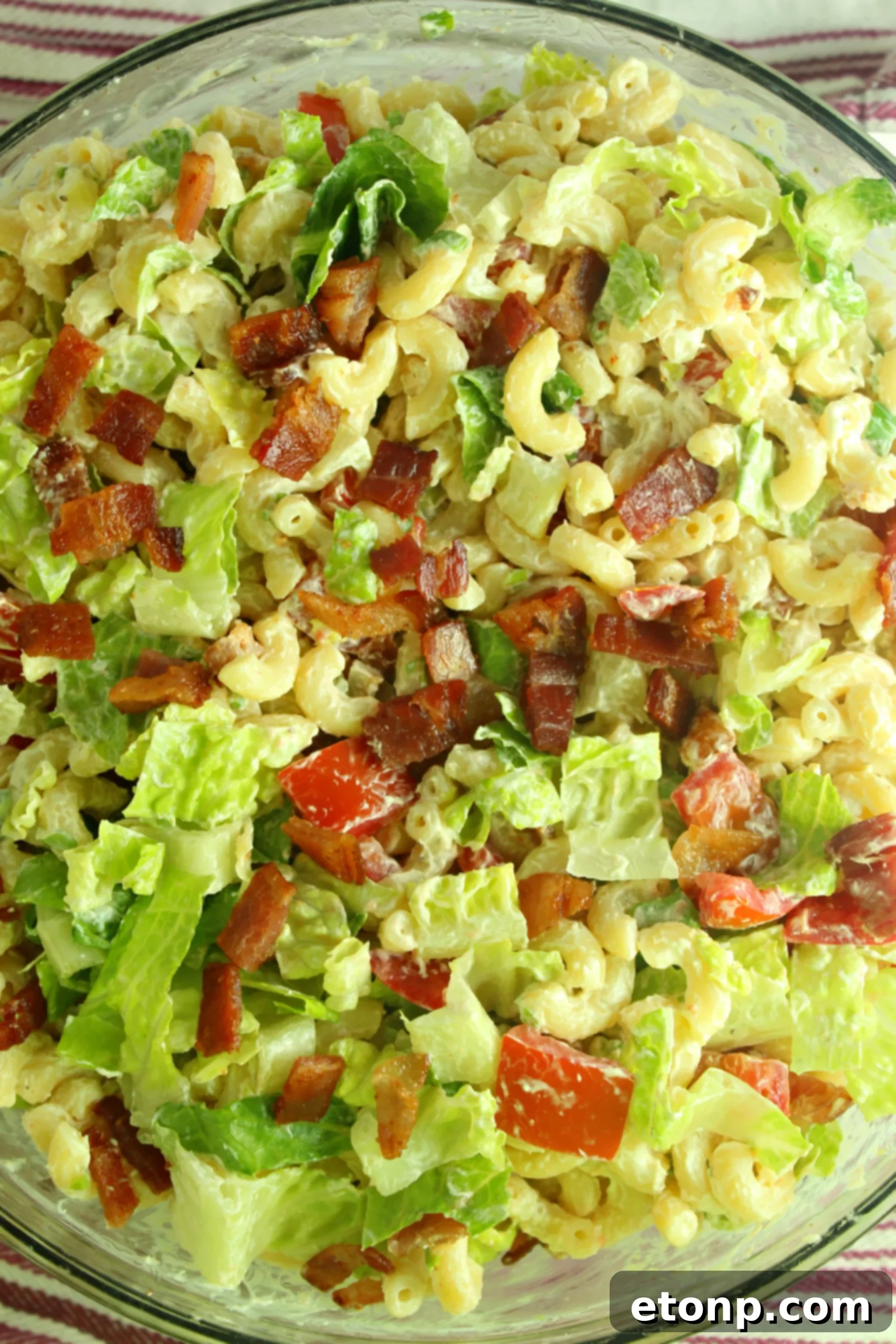 Loaded BLT Pasta Salad 6 A large bowl of BLT Pasta Salad, ready to serve at a gathering, demonstrating its generous portion size.
