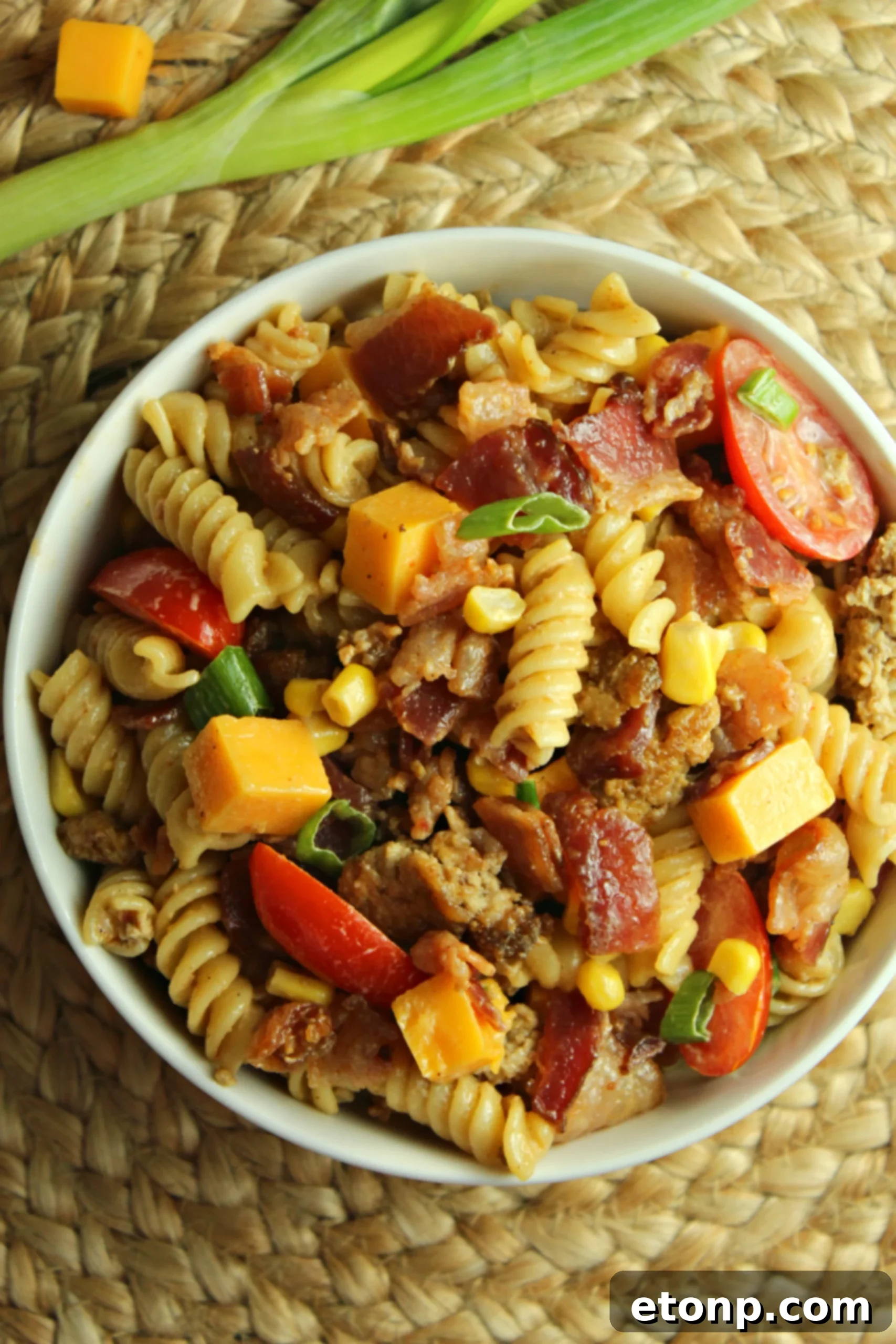 Chuckwagon Pasta Salad 8 A closer view of the Loaded Cowboy Pasta Salad with fresh ingredients and creamy dressing visible.