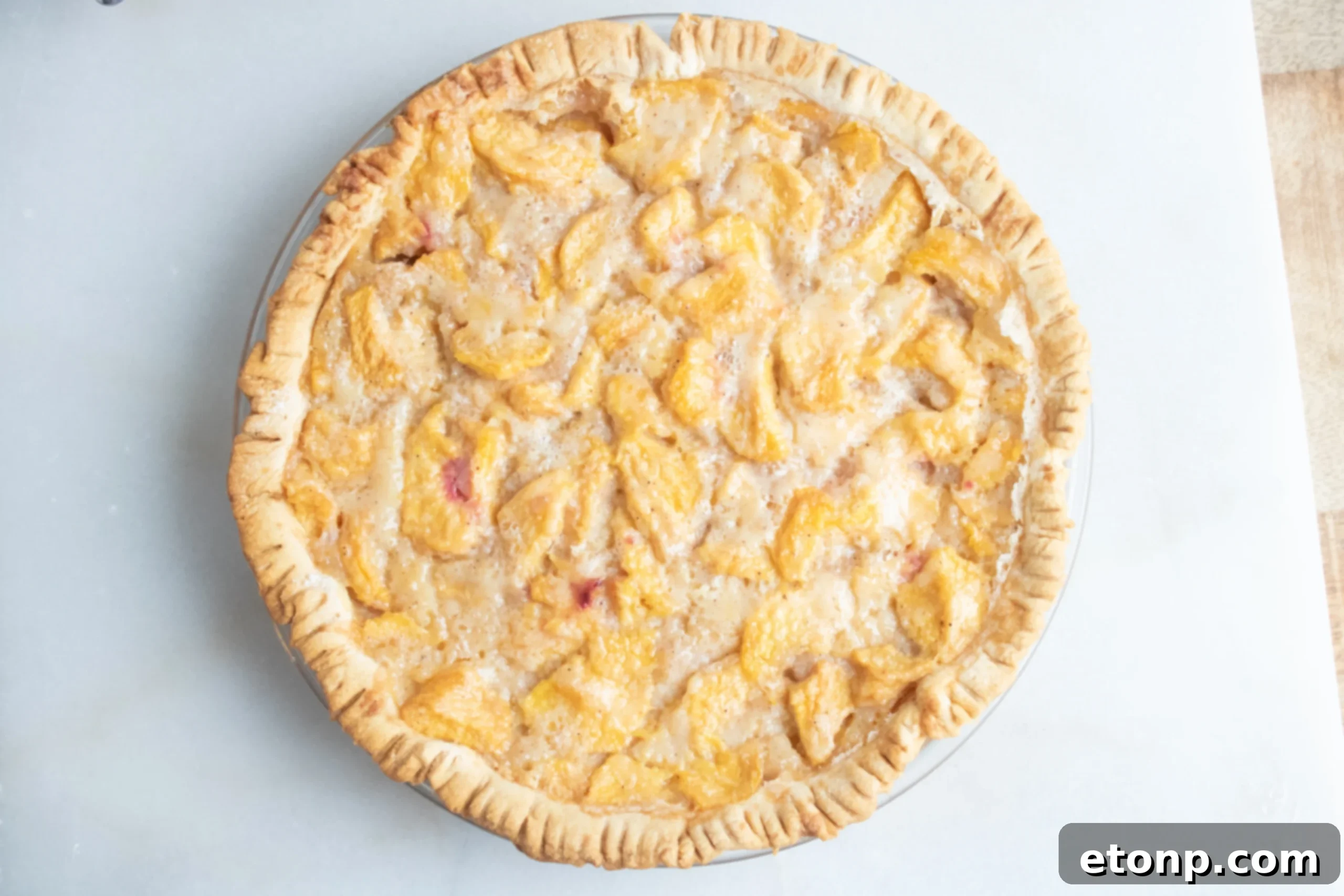 Southern Peach Pie cooling on a wire rack, ready to be served