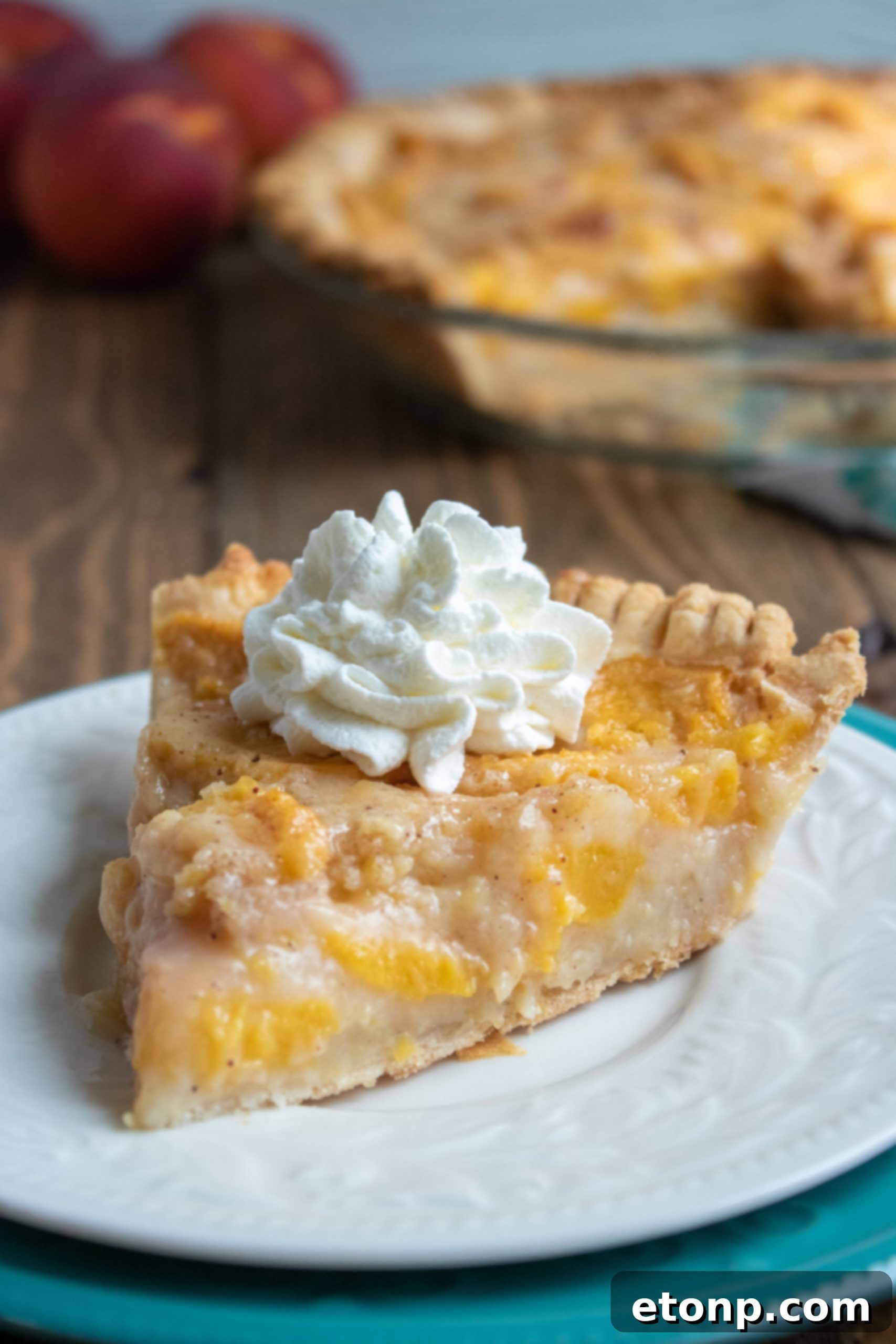 Freshly baked Southern Peach Pie, golden and inviting