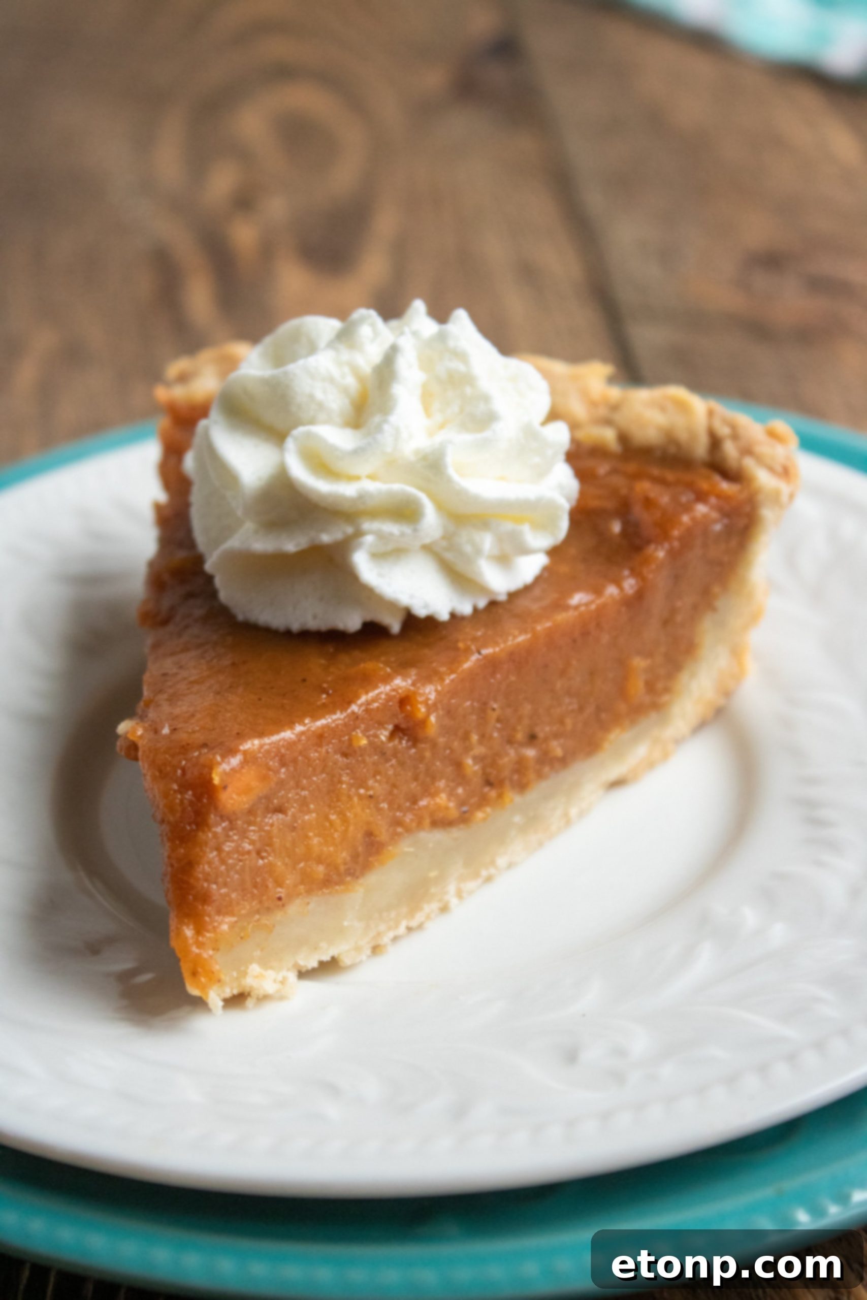 A close-up of the sweet potato pie filling, showing its smooth, rich texture before baking.