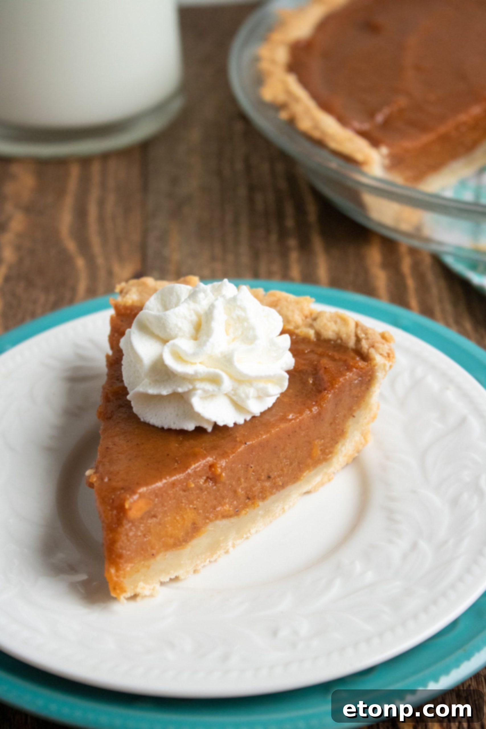 Eight slices of sweet potato pie arranged elegantly on a serving platter, ready for guests.