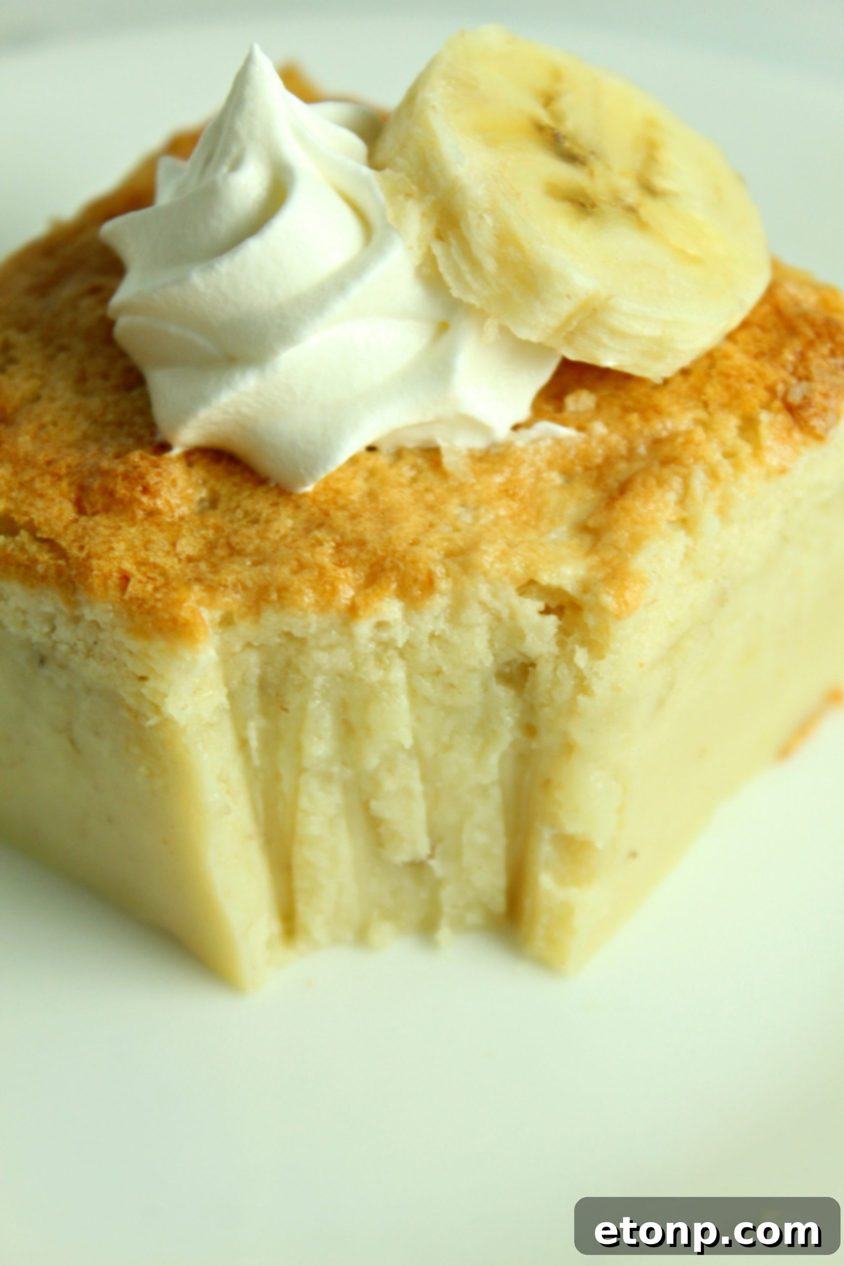 The prepared Banana Magic Cake batter, a thin consistency, poured into a baking pan, ready for the oven.