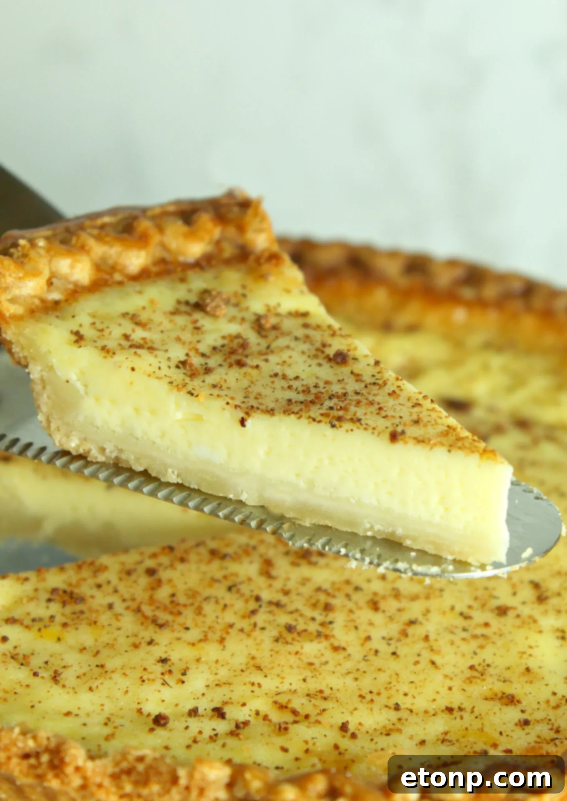 A beautifully baked Old Fashioned Cream Custard Pie, golden brown and perfectly set.