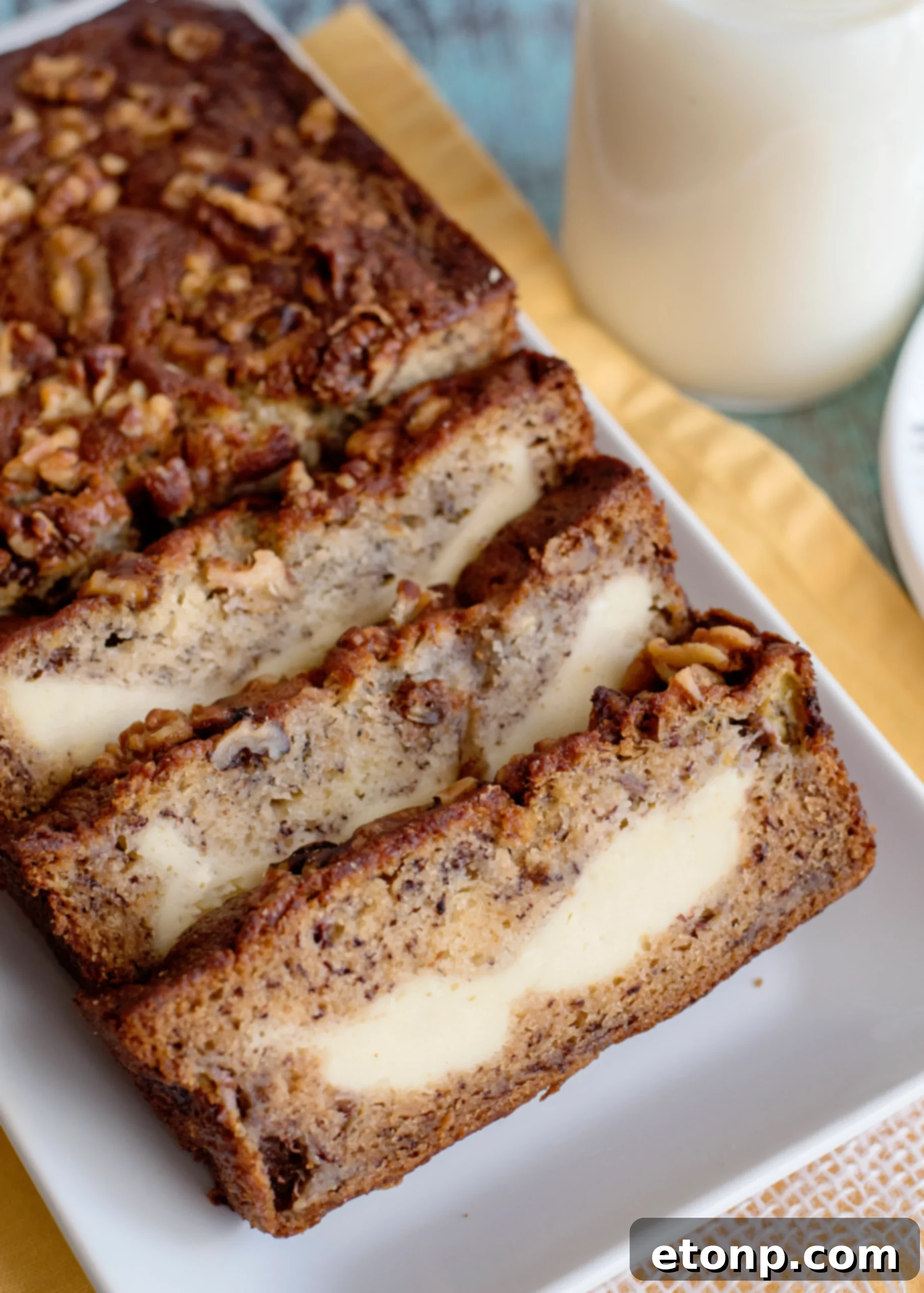 Moist Cream Cheese Banana Bread, a perfect fusion of banana bread and cheesecake.