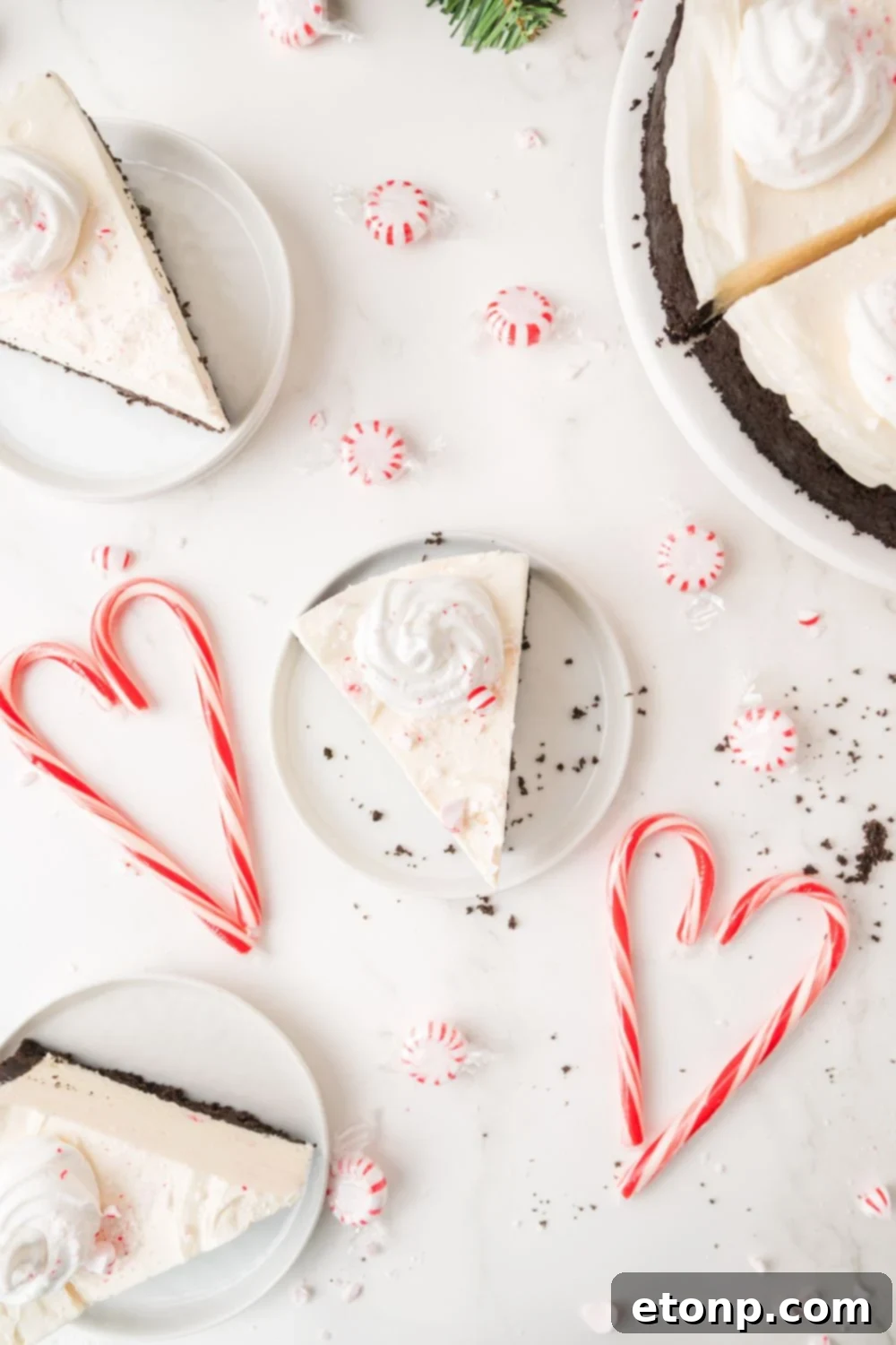 Peppermint Dream Cheesecake: A Festive No-Bake Delight 22 No Bake Peppermint Cheesecake slices on a table
