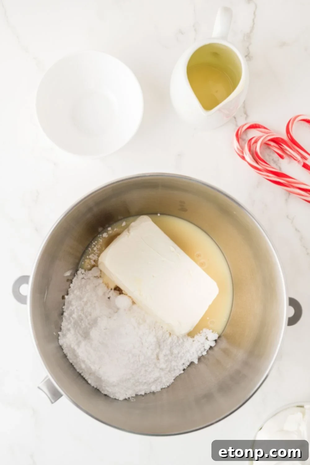 Peppermint Dream Cheesecake: A Festive No-Bake Delight 9 Cream cheese and other ingredients in a bowl