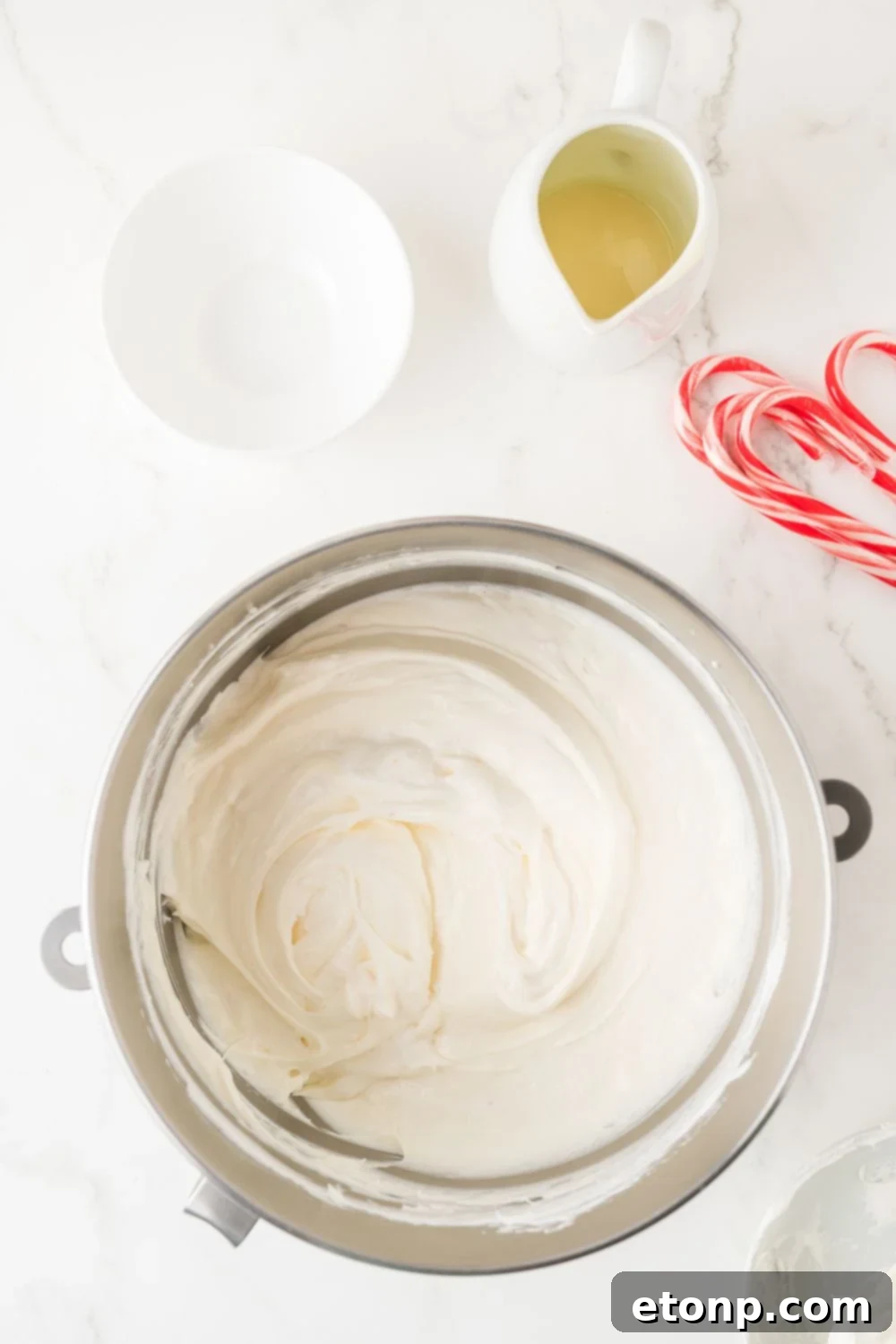 Peppermint Dream Cheesecake: A Festive No-Bake Delight 10 No Bake Peppermint Cheesecake batter in a bowl