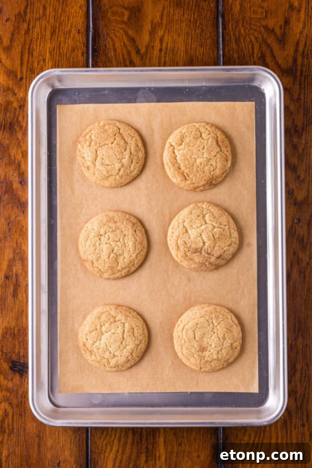 Biscoff Bliss: Soft-Baked Cinnamon Butter Cookies 14 Snickerdoodle cookies on a baking tray