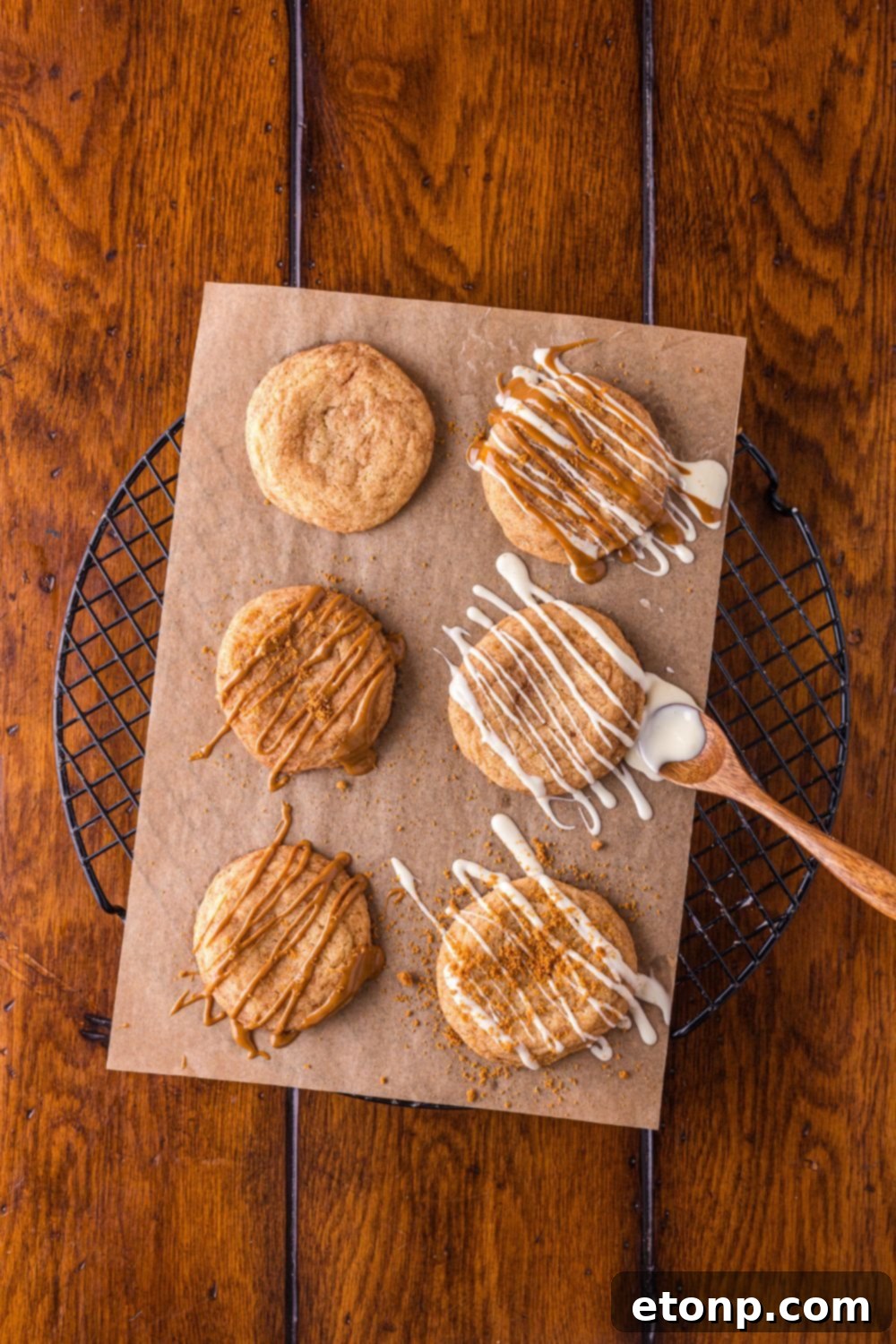 Biscoff Bliss: Soft-Baked Cinnamon Butter Cookies 15 Biscoff Snickerdoodle Cookies drizzled with cookie butter and white chocolate