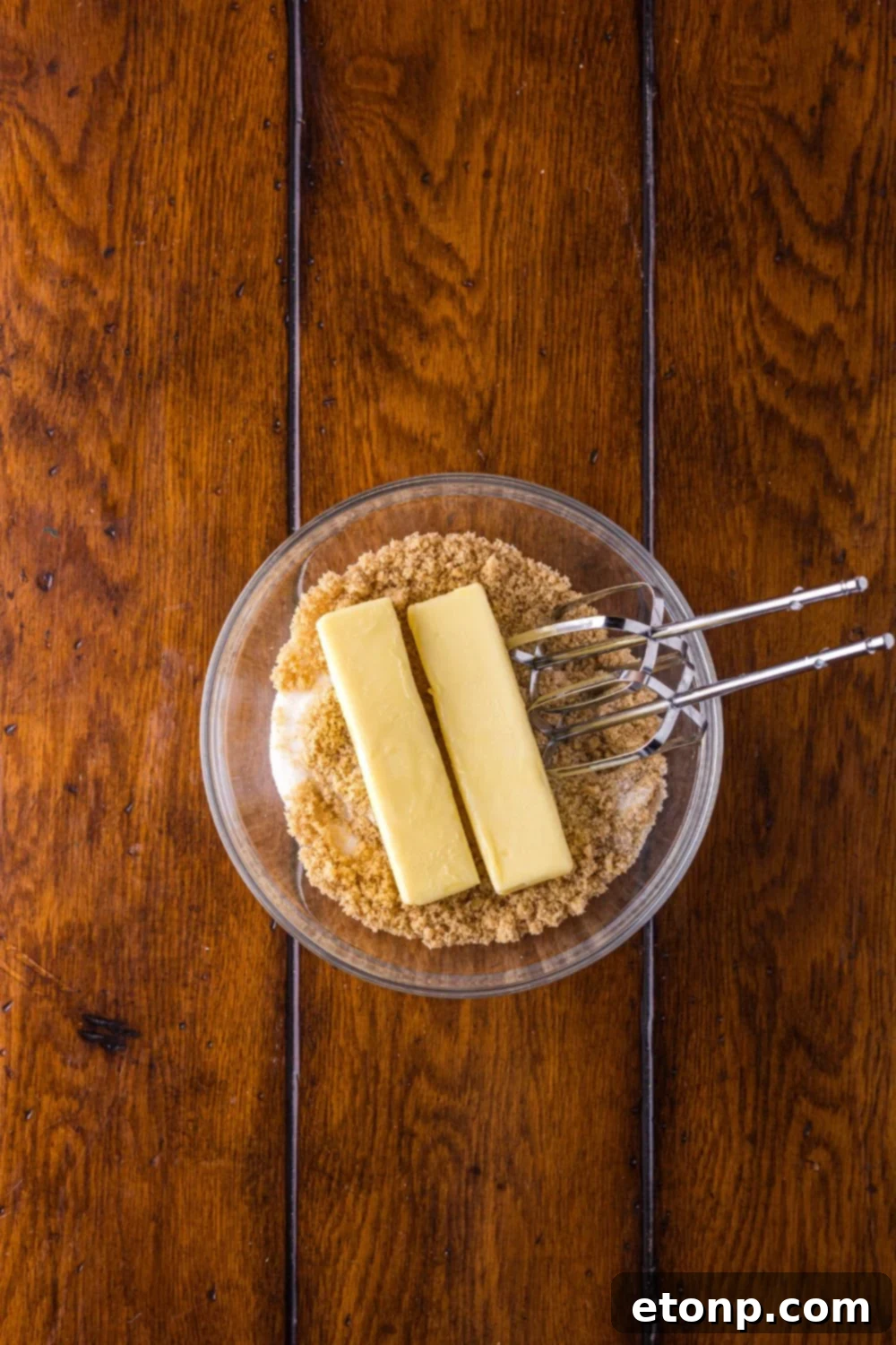 Biscoff Bliss: Soft-Baked Cinnamon Butter Cookies 8 Brown sugar and butter with a glass bowl
