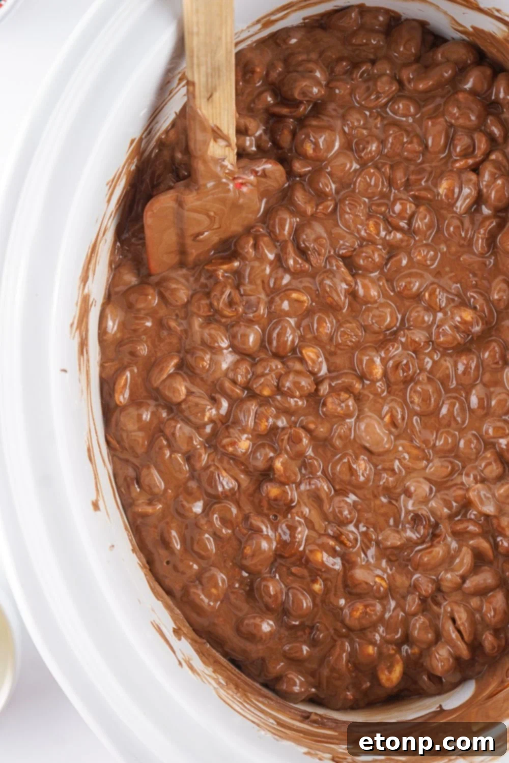 Slow Cooker Holiday Fudge: 4-Ingredient Magic 9 Crockpot full of Christmas candy