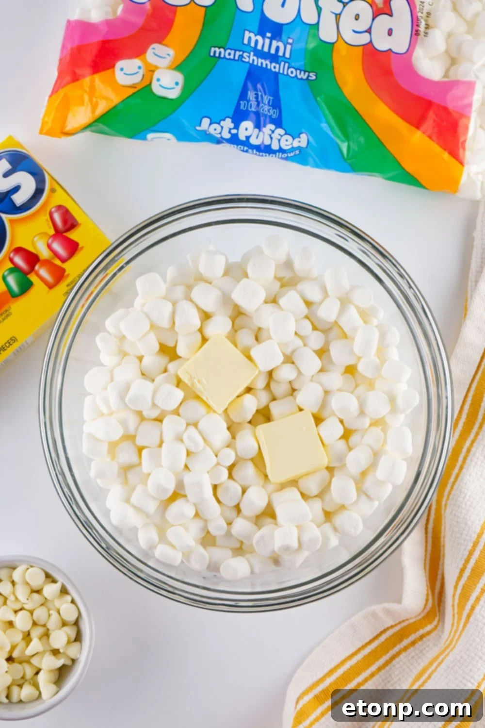 Holiday Gumdrop Nougat: A Nostalgic Christmas Treat 5 Marshmallow and butter in a glass bowl on table