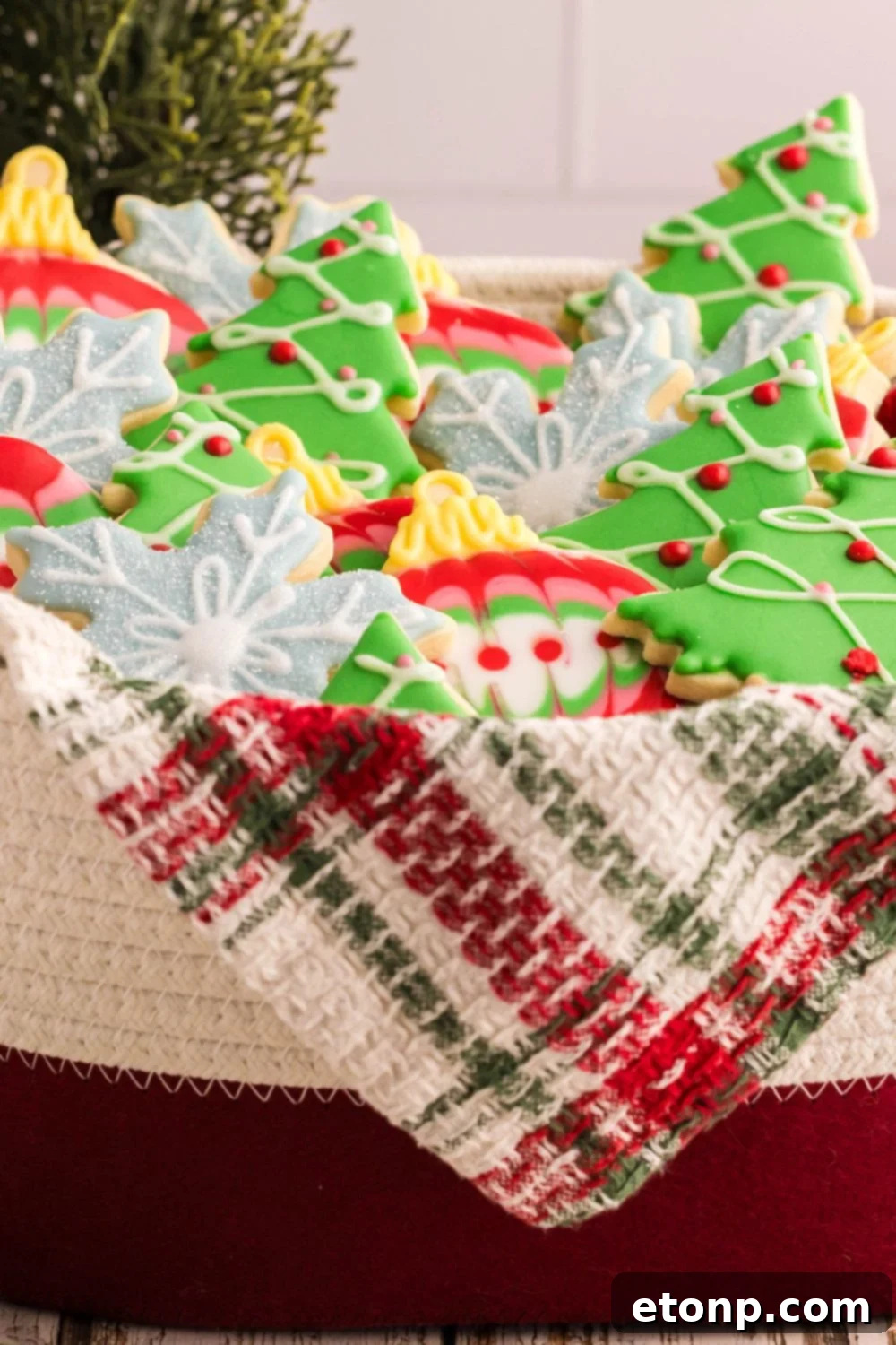 Adorned Sugar Cookies: Soft, Shapely, and Icing-Ready 32 Christmas-themed Decorated Sugar Cookies in a woven basket.