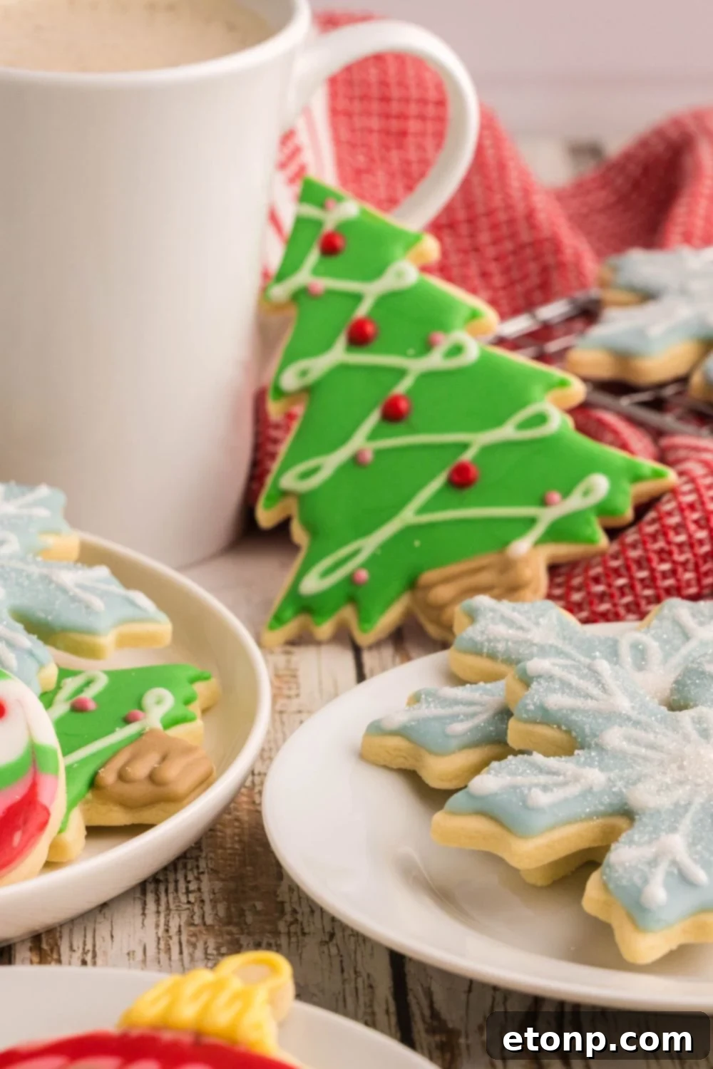 Adorned Sugar Cookies: Soft, Shapely, and Icing-Ready 33 Christmas-themed table with coffee and Decorated Sugar Cookies.