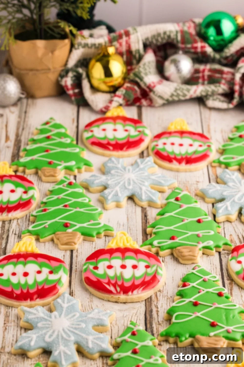 Adorned Sugar Cookies: Soft, Shapely, and Icing-Ready 36 Decorated Sugar Cookies placed around the table with Christmas ornaments.