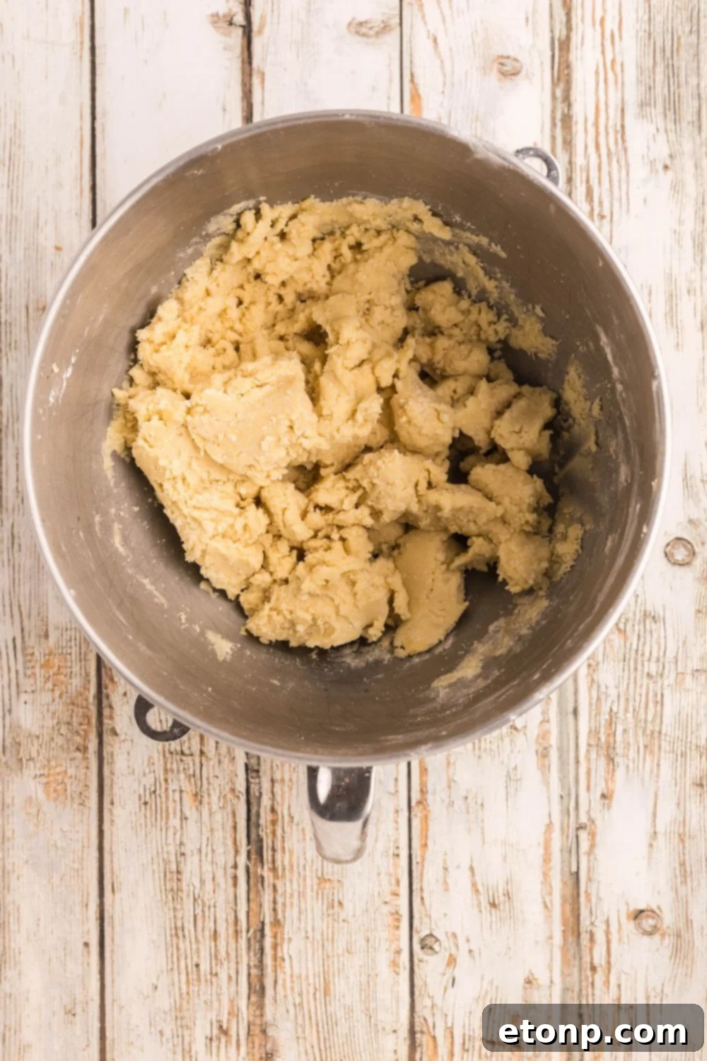 Adorned Sugar Cookies: Soft, Shapely, and Icing-Ready 10 Creamed butter and sugar in a metal bowl for sugar cookie dough.
