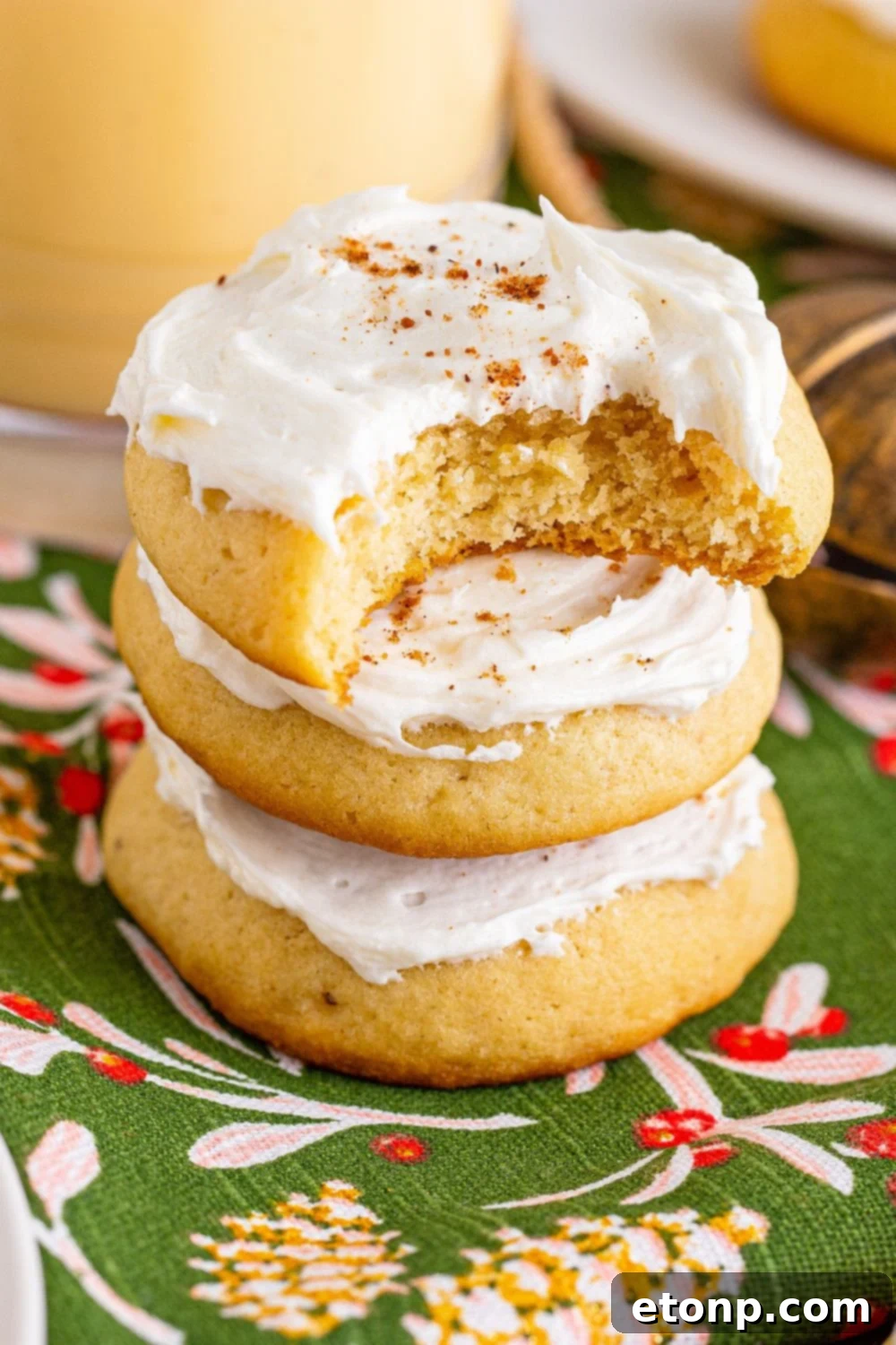 Soft Frosted Eggnog Cookies (Bakery Style Holiday Cookies) Delectable Holiday Eggnog Delights 4 Soft Frosted Eggnog Cookies with eggnog glass
