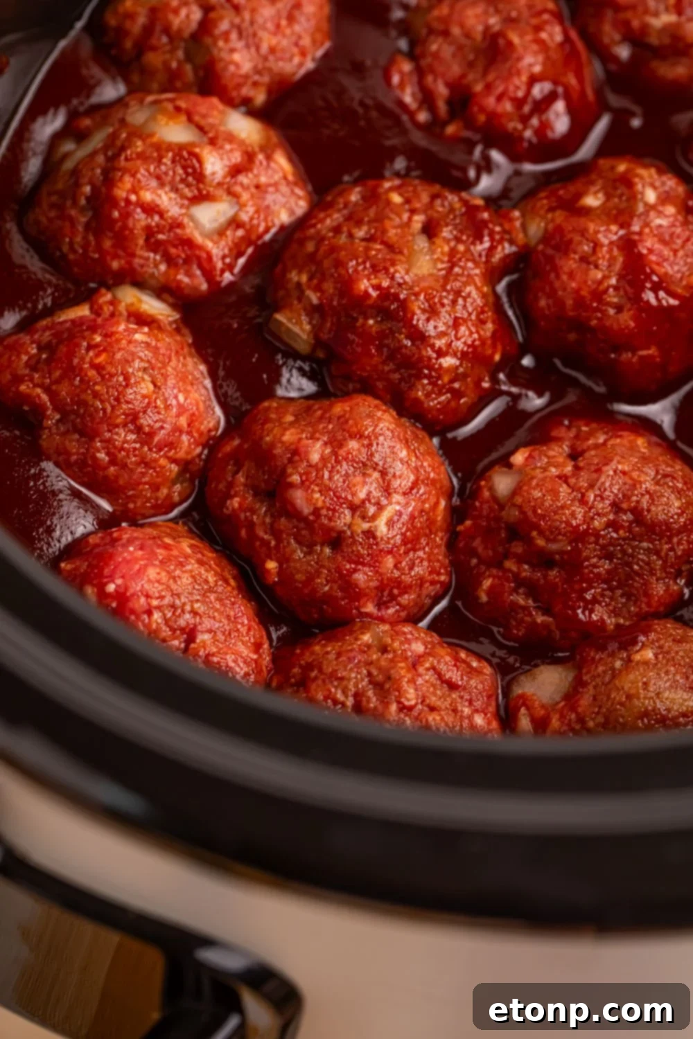 Slow-Cooker BBQ Meatball Magic 12 Crockpot Homemade BBQ Meatballs cooking in the CrockPot