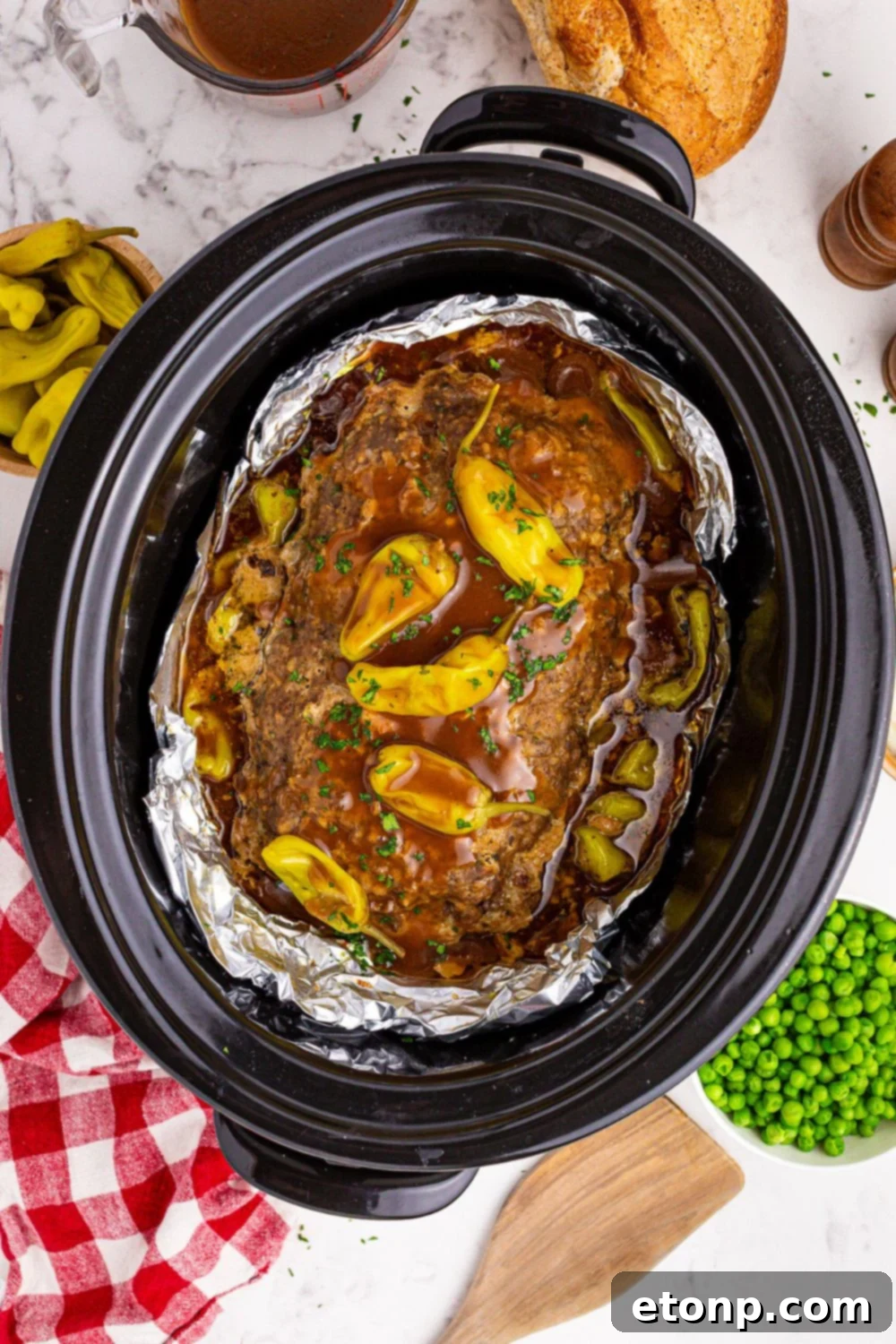 Crockpot Mississippi Meatloaf with gravy and peppers