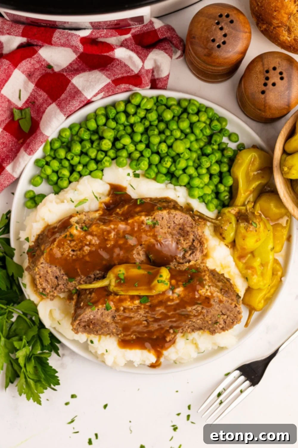 Crockpot Mississippi Meatloaf on a table setting