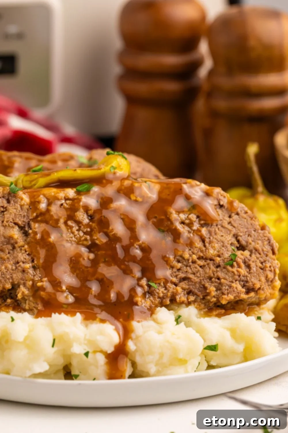 Mashed potatoes with Crockpot Mississippi Meatloaf