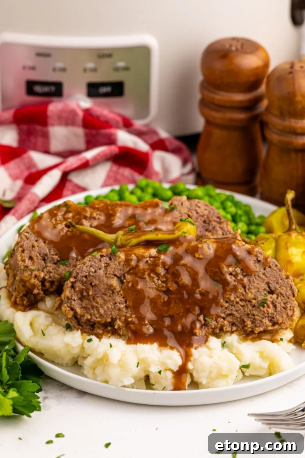 Table setting with Crockpot Mississippi Meatloaf