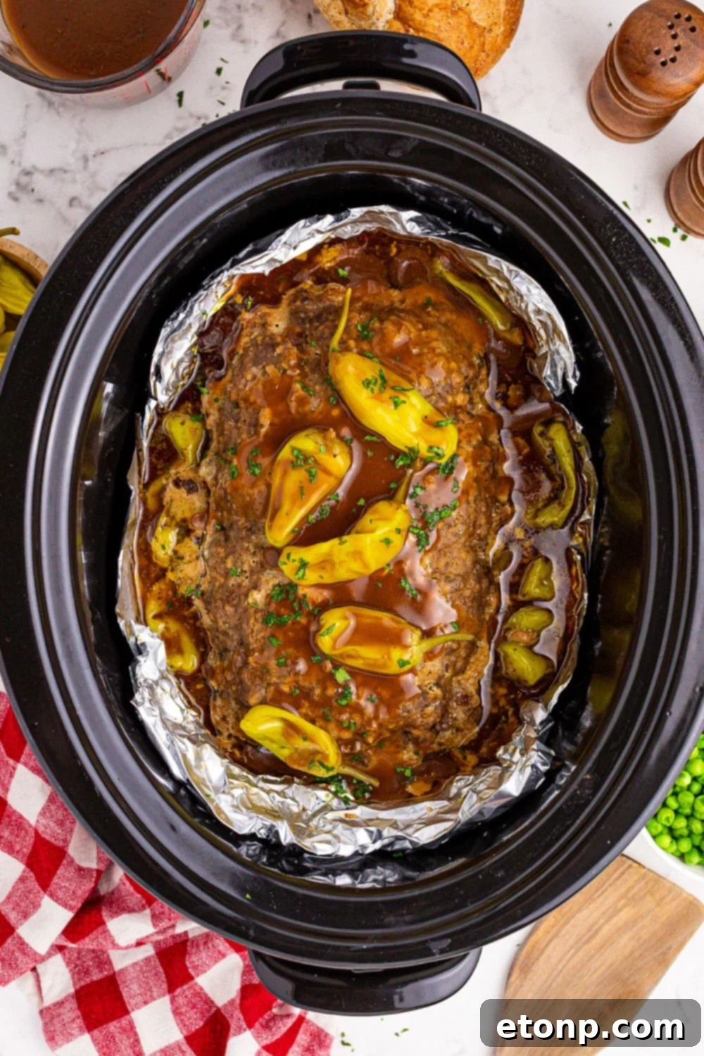 Crockpot Mississippi Meatloaf with gravy and peppers