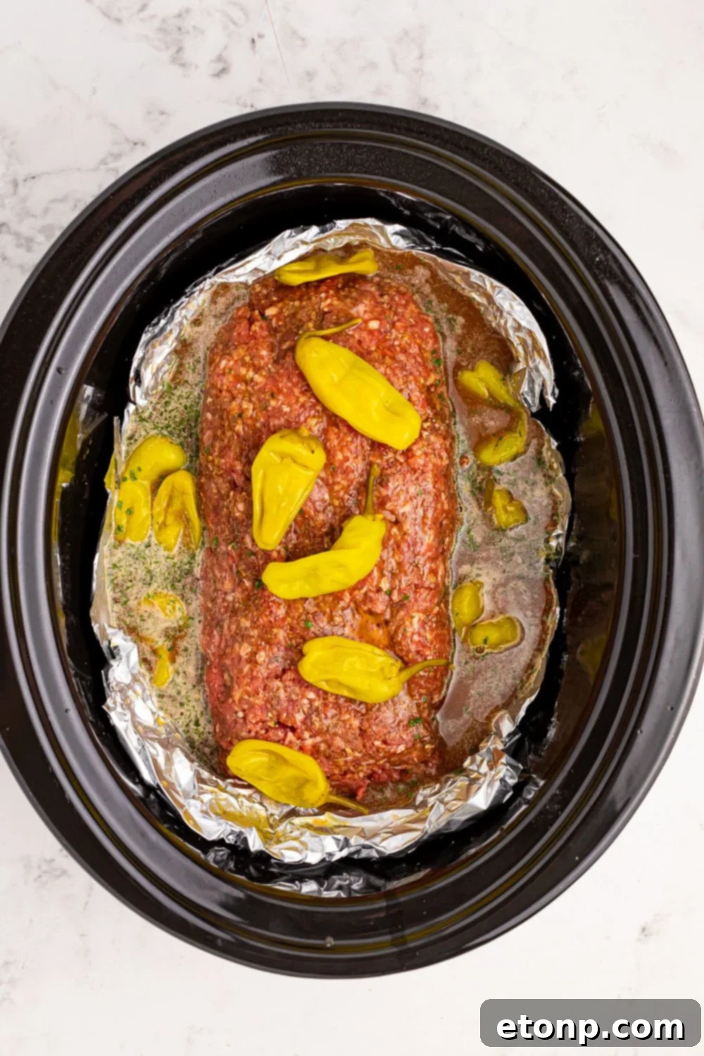 Pepperoncini peppers on top of meatloaf
