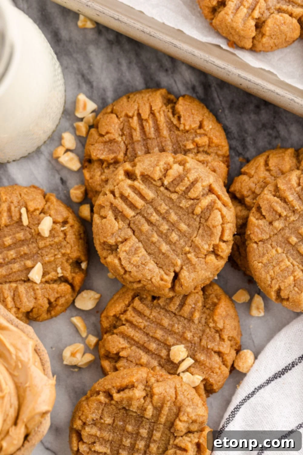 Four-Ingredient Peanut Butter Bliss: The Simplest Cookie Recipe Ever 13 Four Ingredient Peanut Butter Cookies with milk