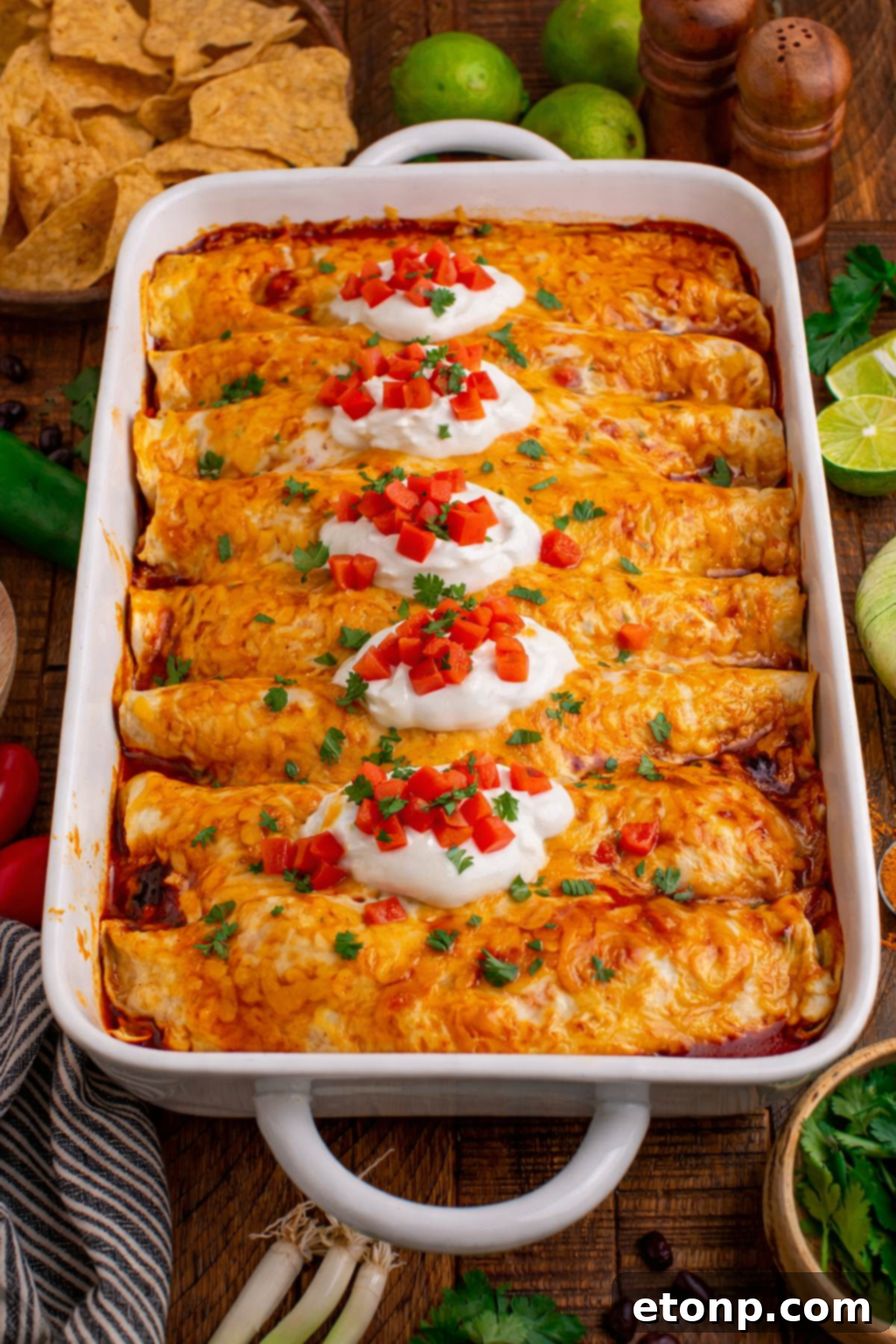 Beefy Enchiladas: A Fiesta of Flavor 18 Stacked Steak Enchiladas with toppings