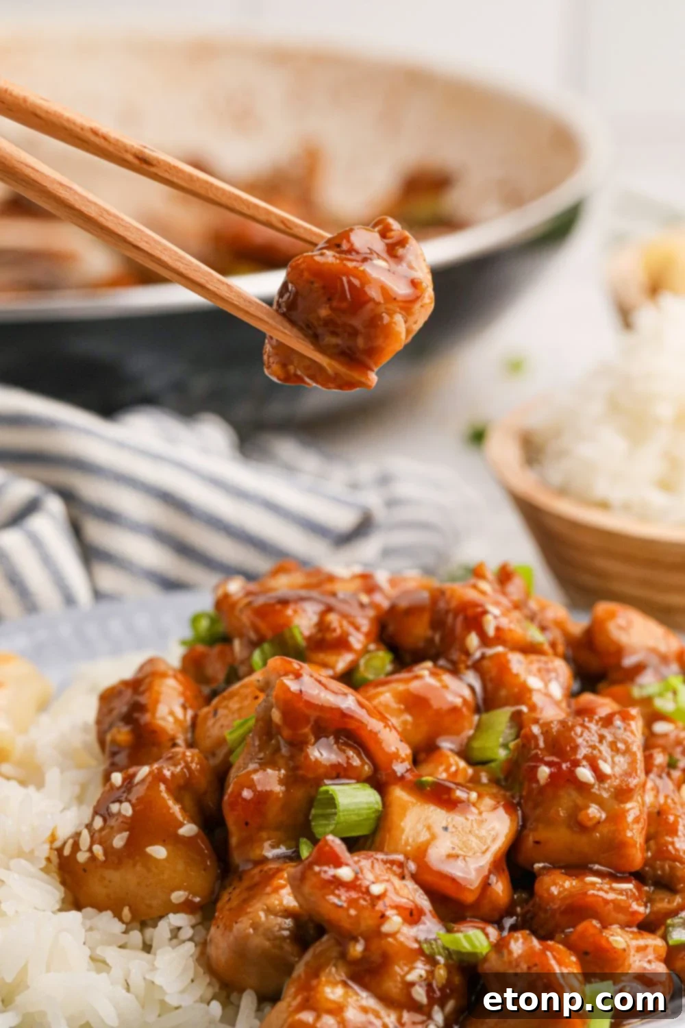 Bourbon Chicken with chopsticks